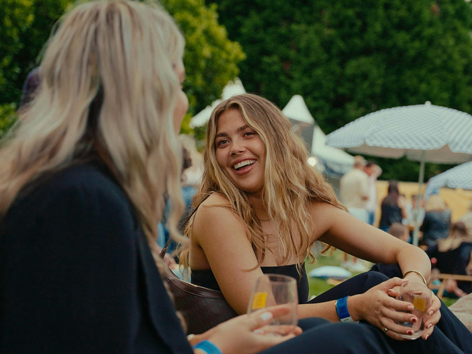 Image of two people smiling at the Tasmanian Wine Festival