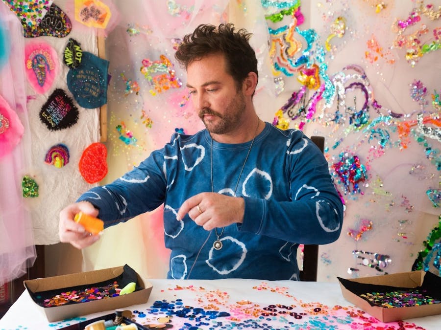 Liam Benson creating with thread and sequins