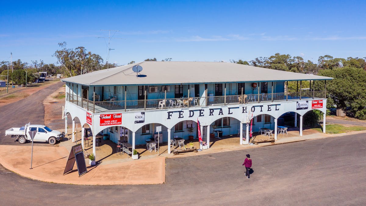 An aerial exterior image of a large two-story pub
