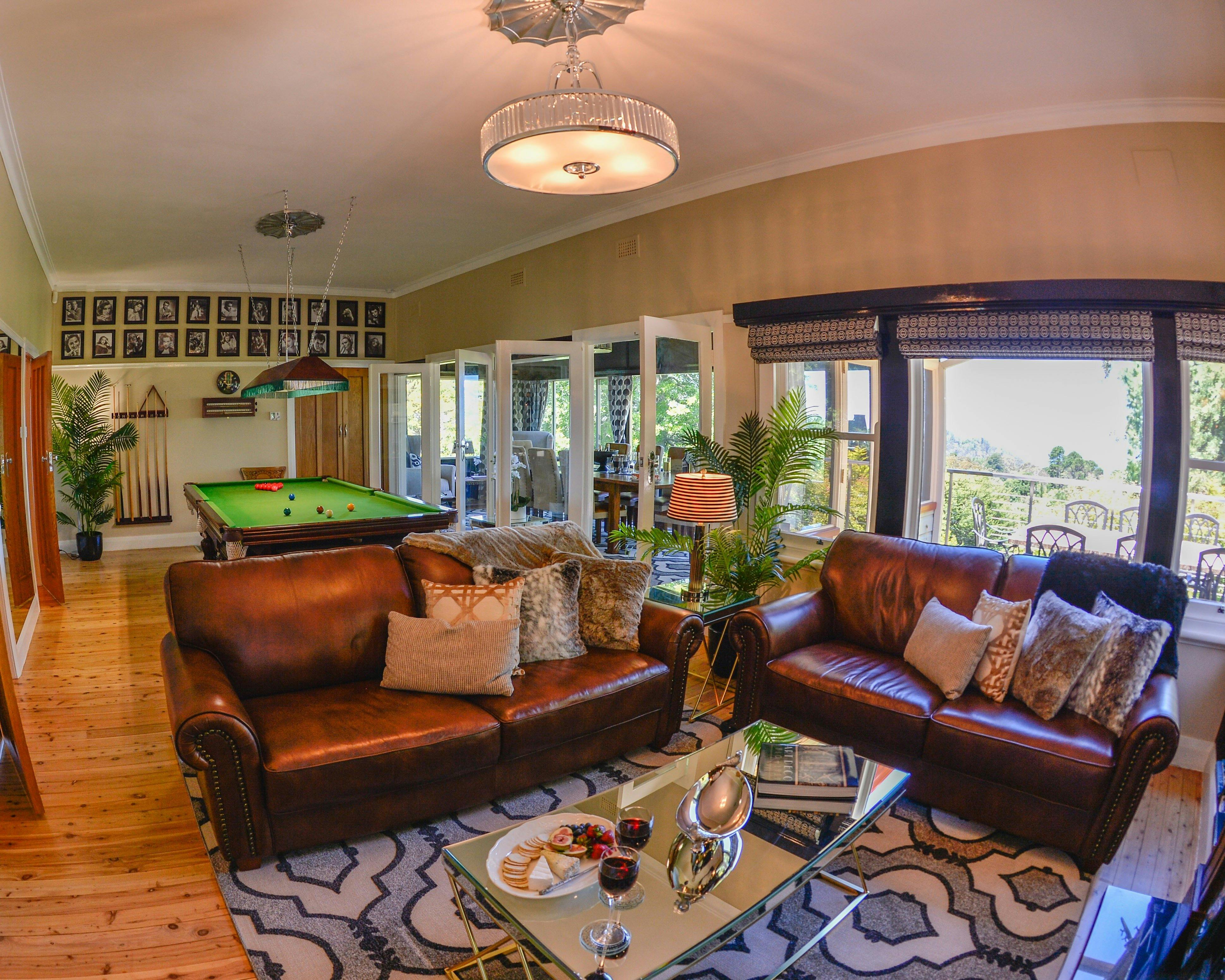 Plush lounge room with billiard table and views across the Jamison Valley