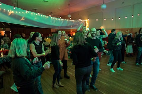 A crowd of people on the dance floor at SurfLife 2023.