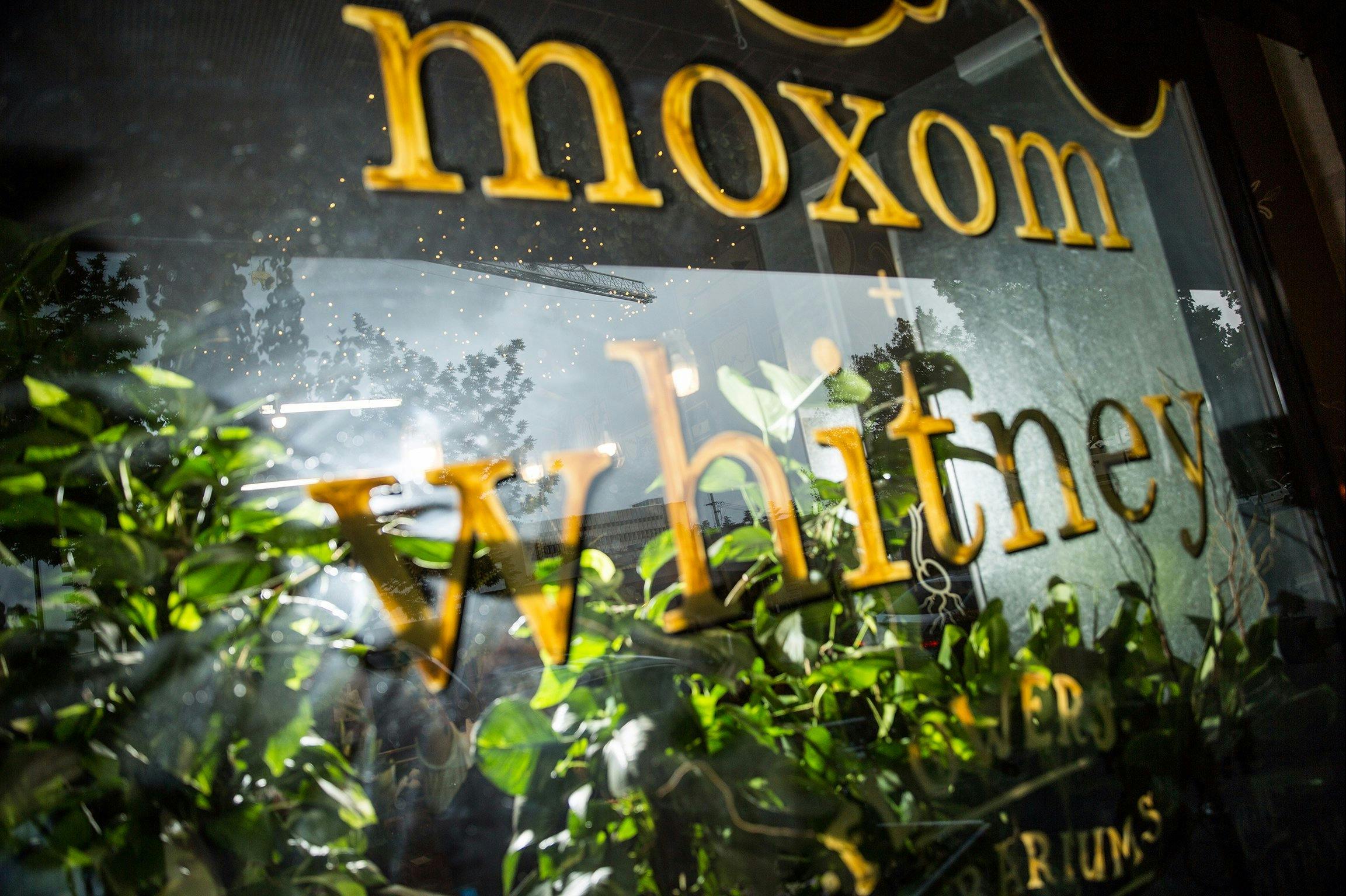 Moxom + Whitney front window