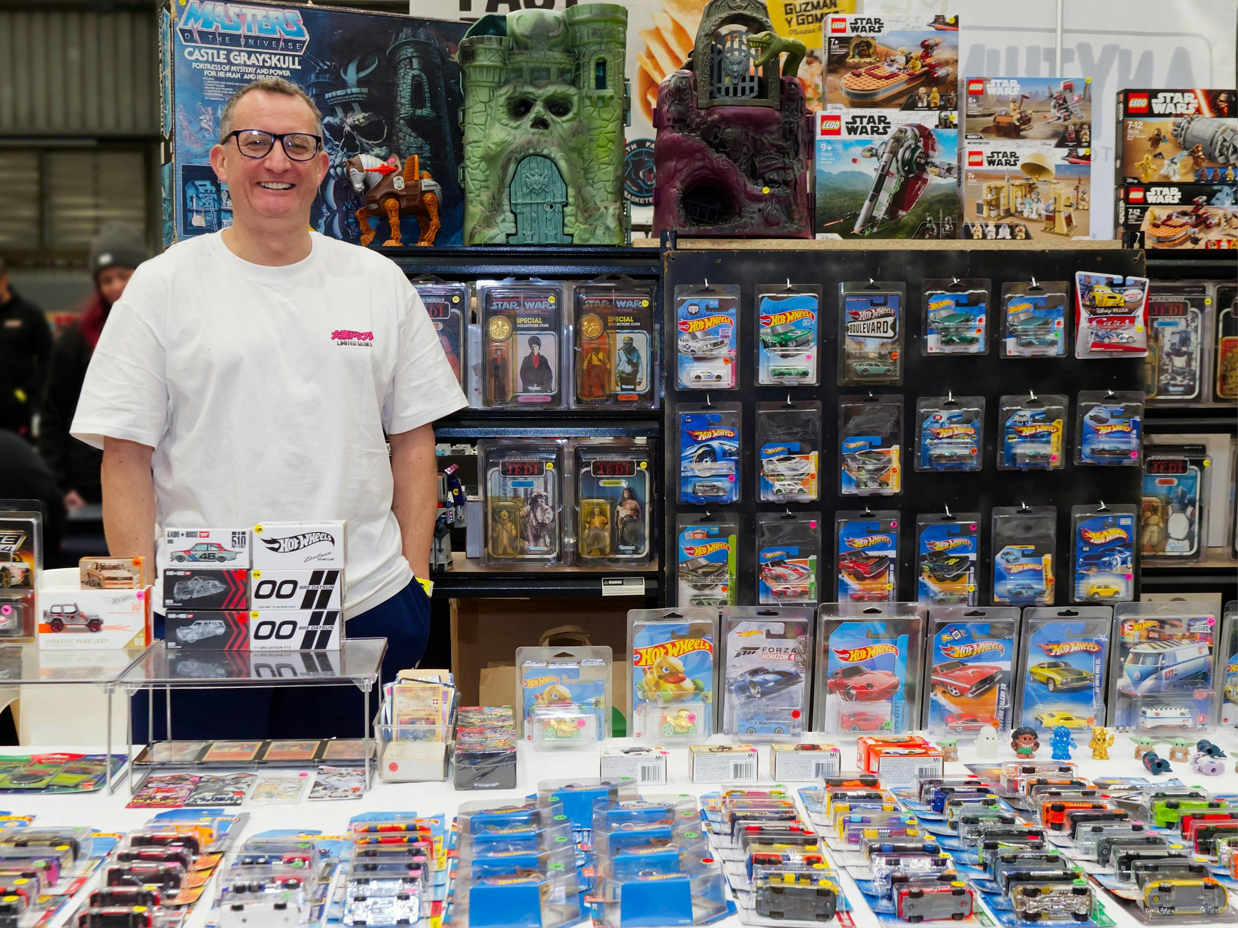Stallholder at their diecast cars and collectables stall