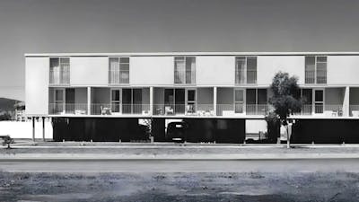 A black and white photo of the Northbourne Ave Flats in brutalist style from the road