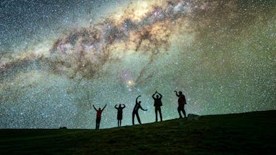 Photographers under the milky way