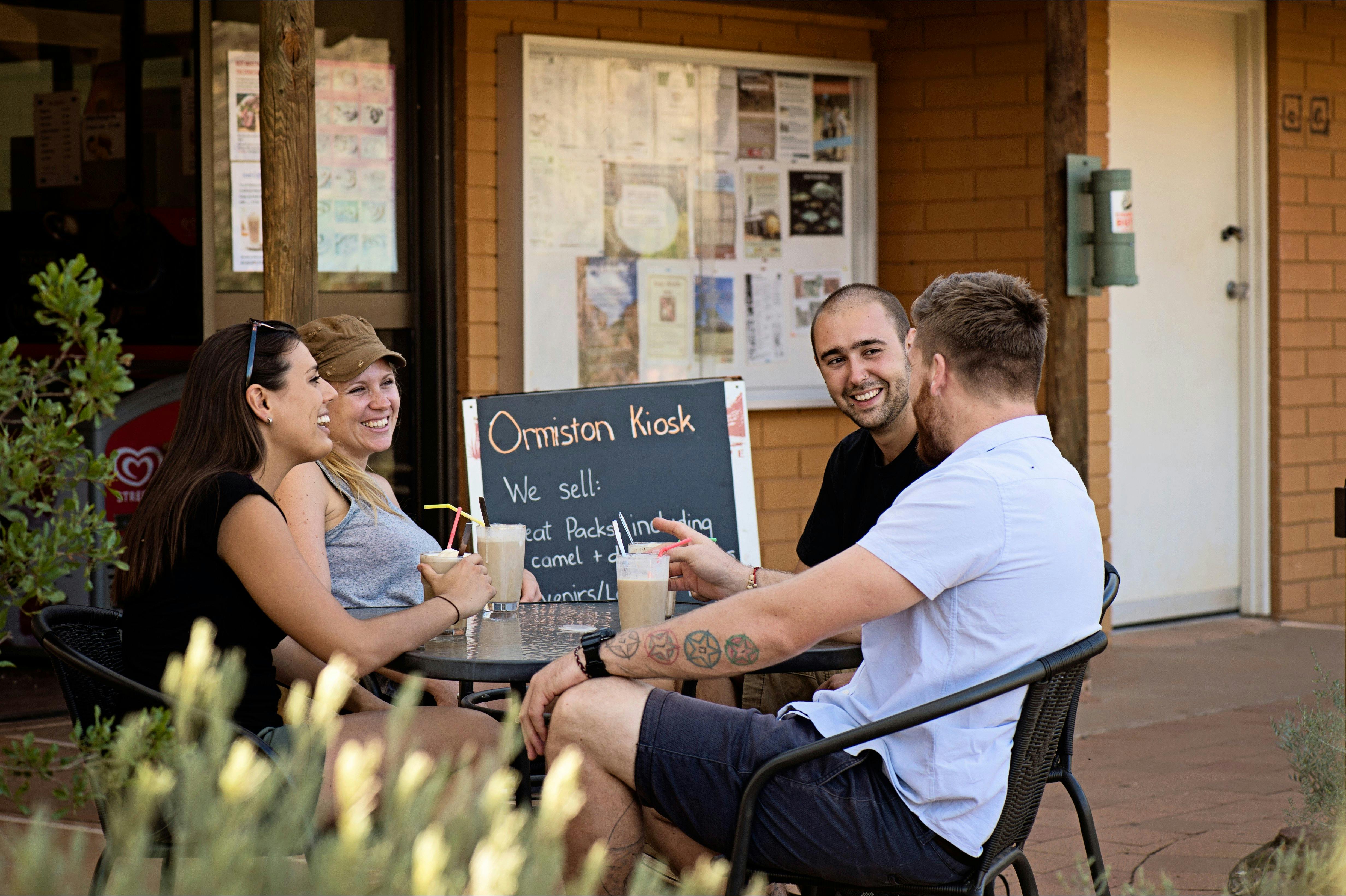 A group of friends having drinks at the Ormiston Kiosk