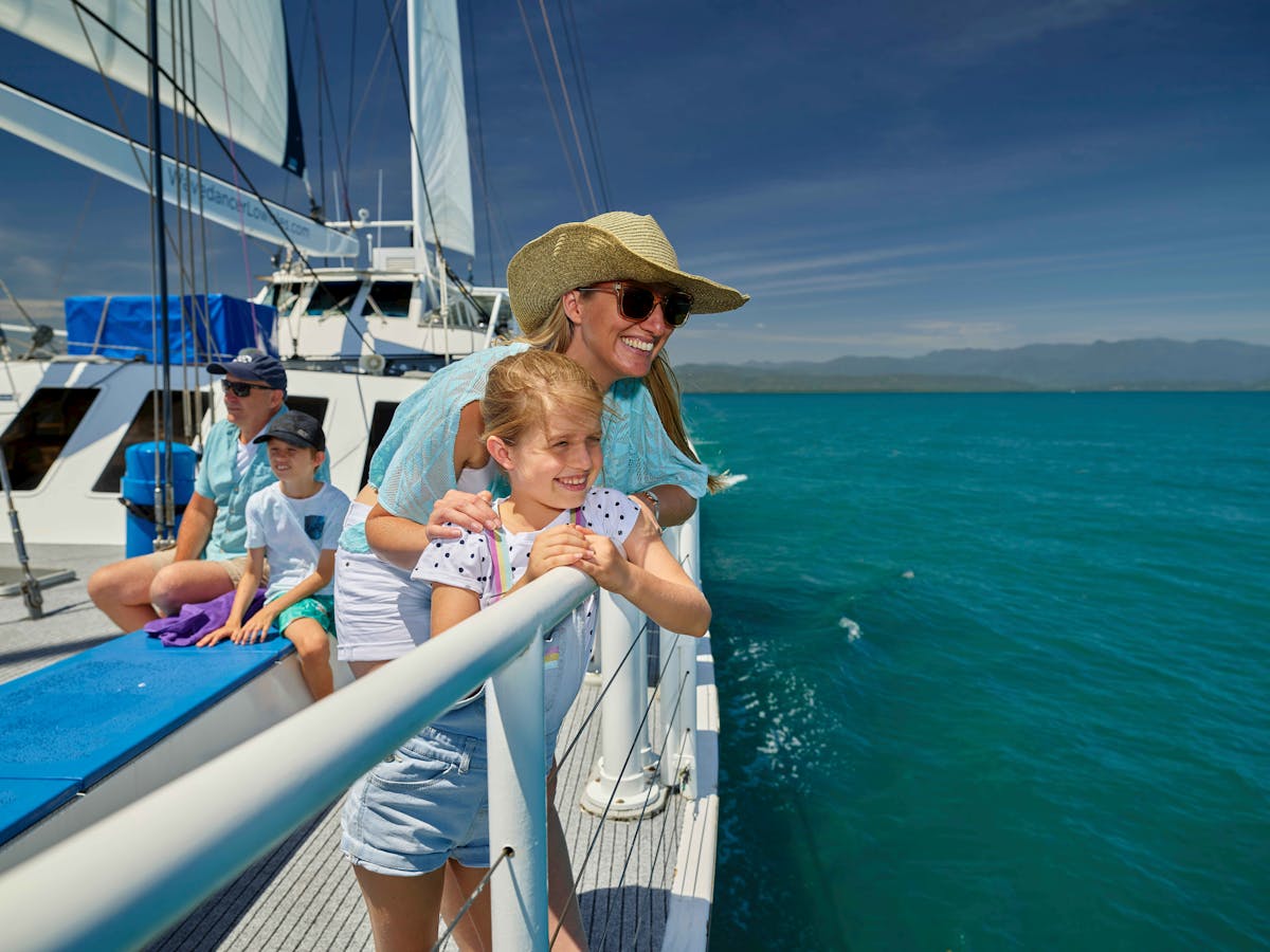 family sailing to Low Isles