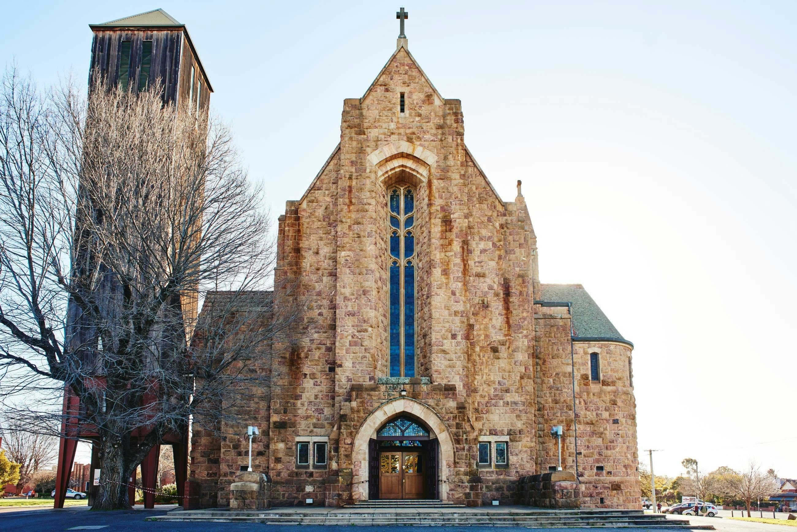 Cathedral, granite historic church, wooden bell tower
