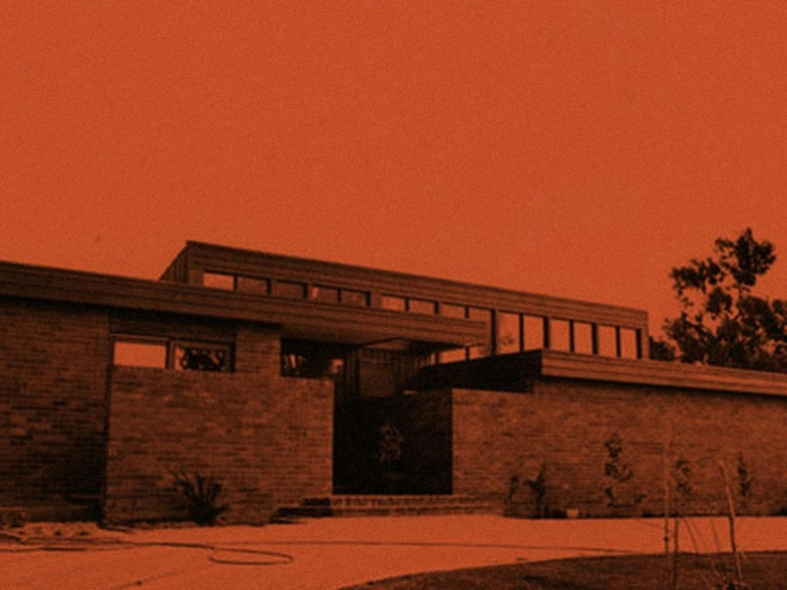 An orange photograph of a building.