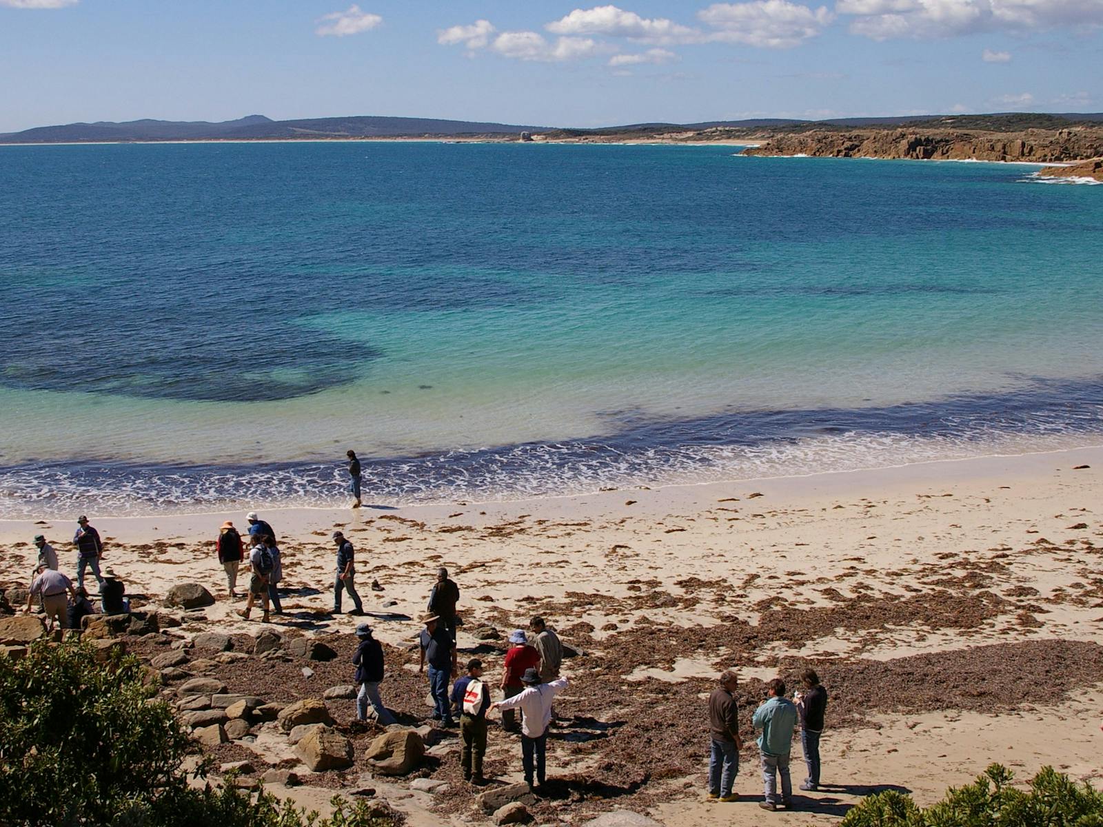 Group walks to Castle Rock from Emita Beach Flinders Island Tasmania