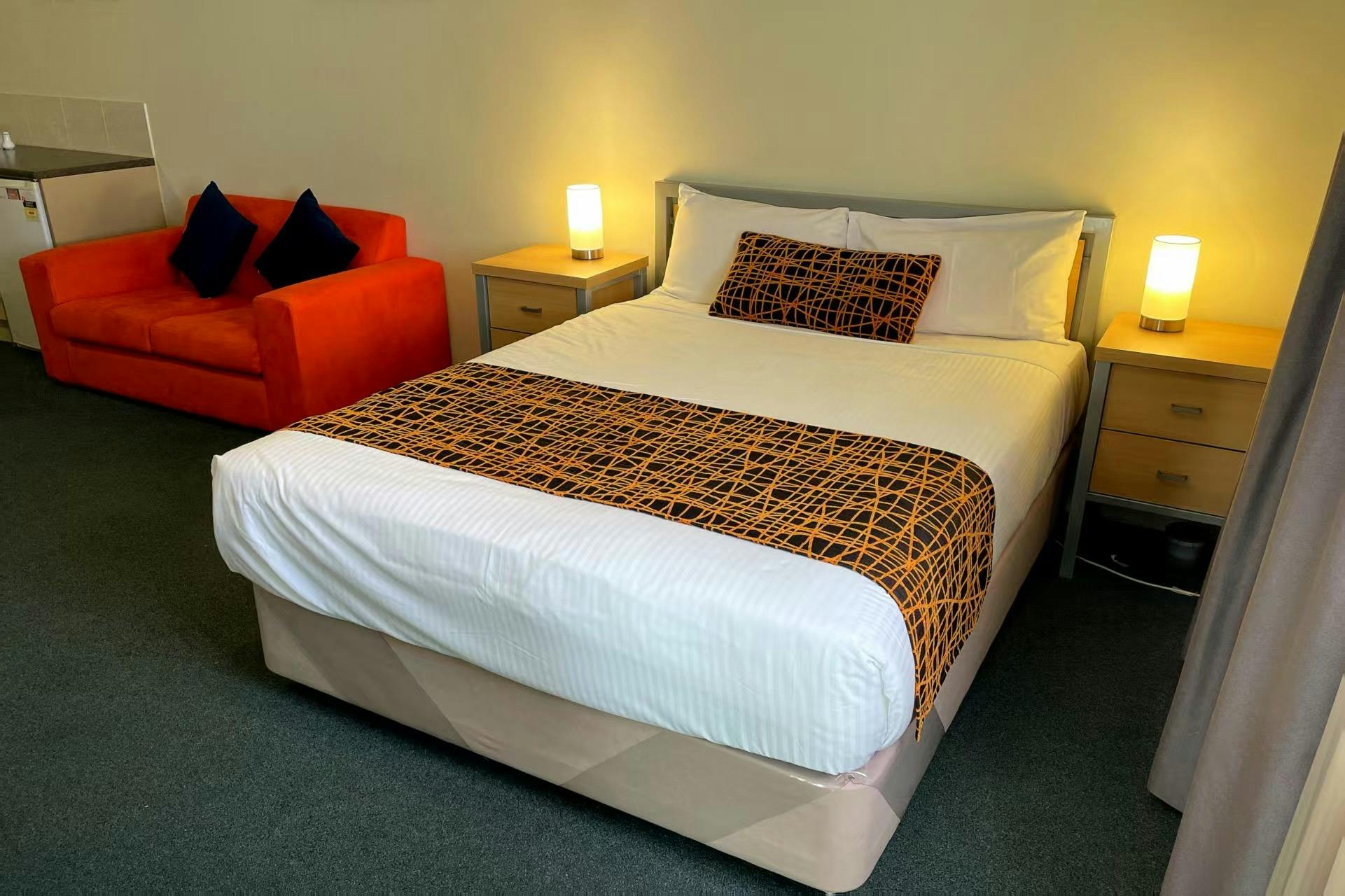 Our Family room has a kitchenette and an extra bedroom with 2 x single beds.