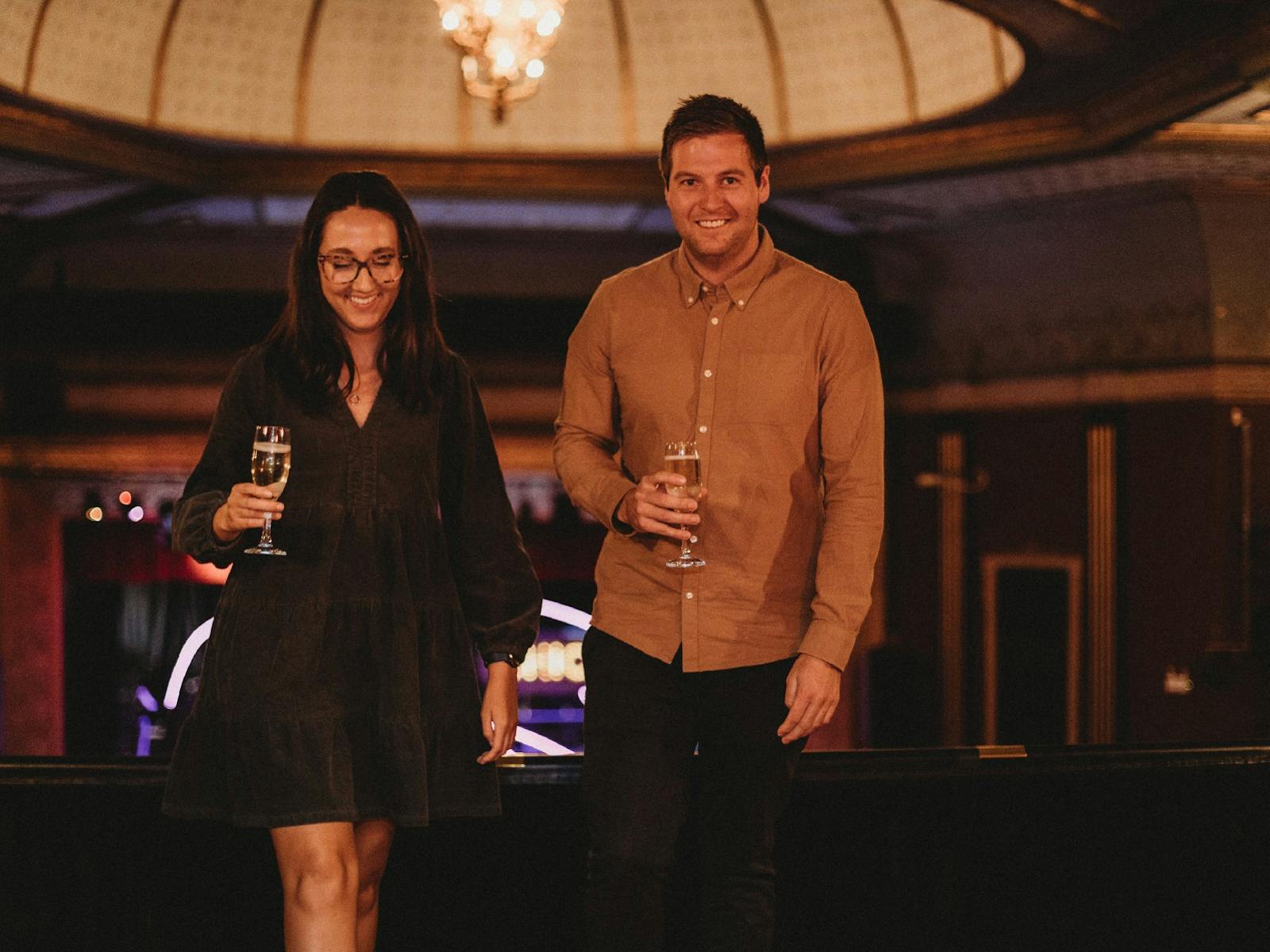 two people exiting the Princess Theatre