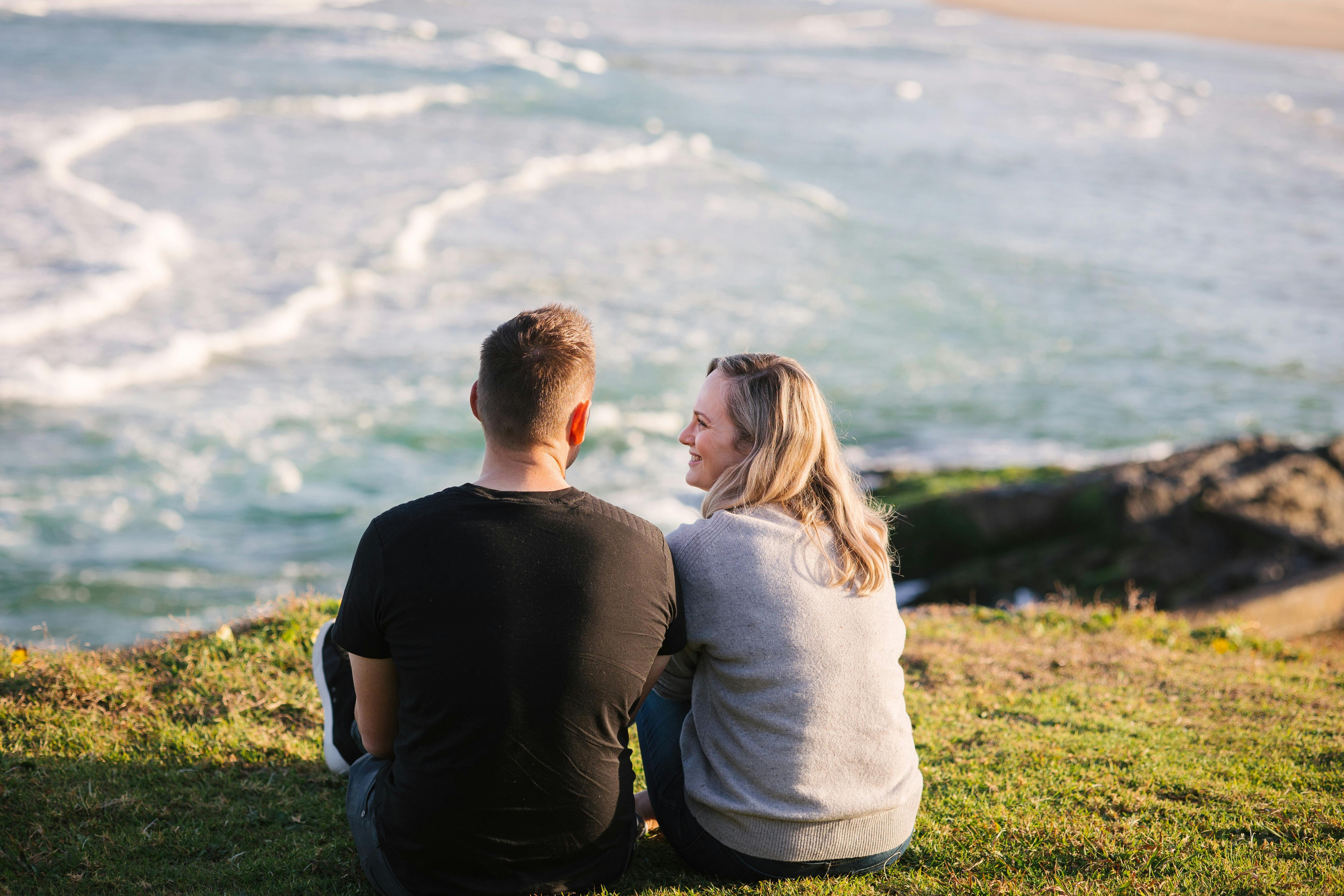 Couple sitting on Sawtell Headland