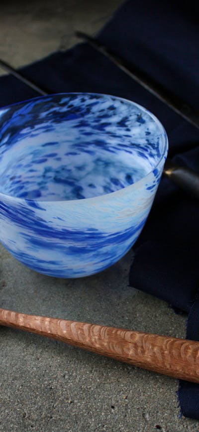 hand carved wooden spoon, and blown bowl