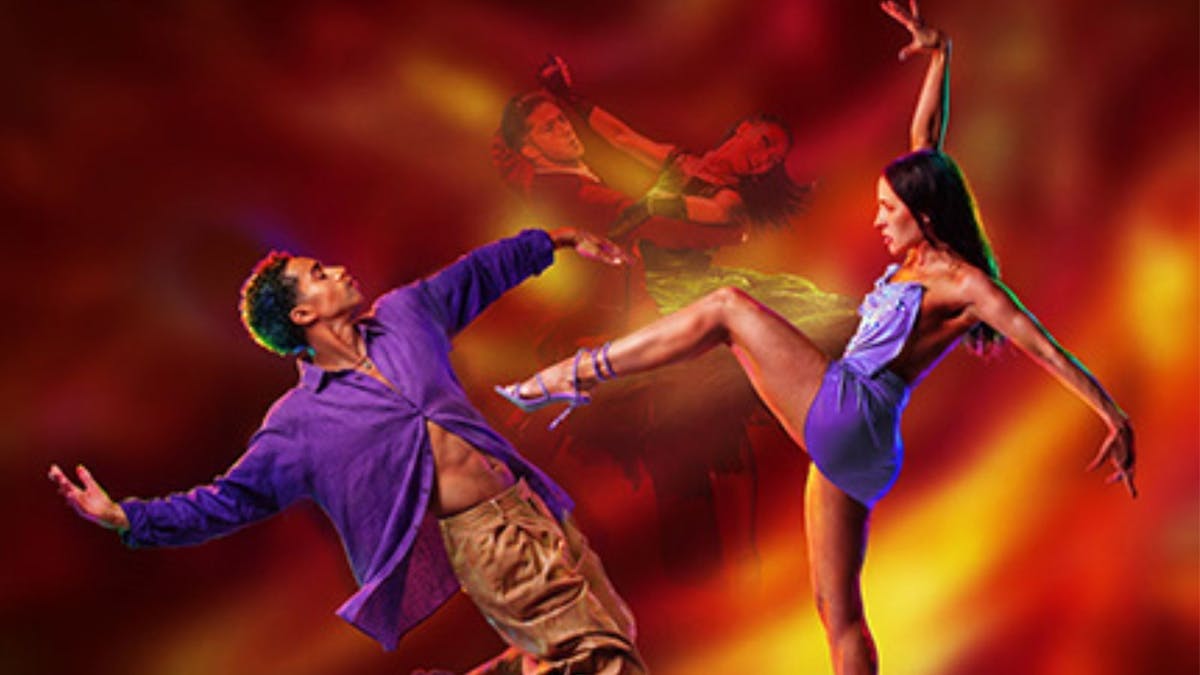 Couple with purple shirts him on his knees and she has got 1 leg on his chest