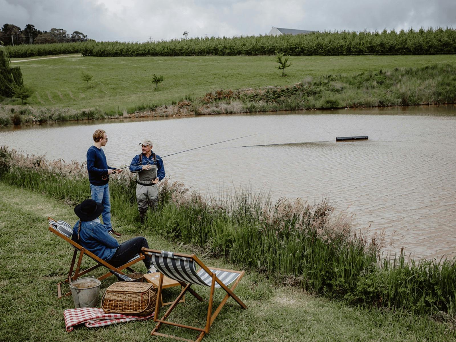 Deck chairs set-up on the edge of the lake. Fly Fishing Experience