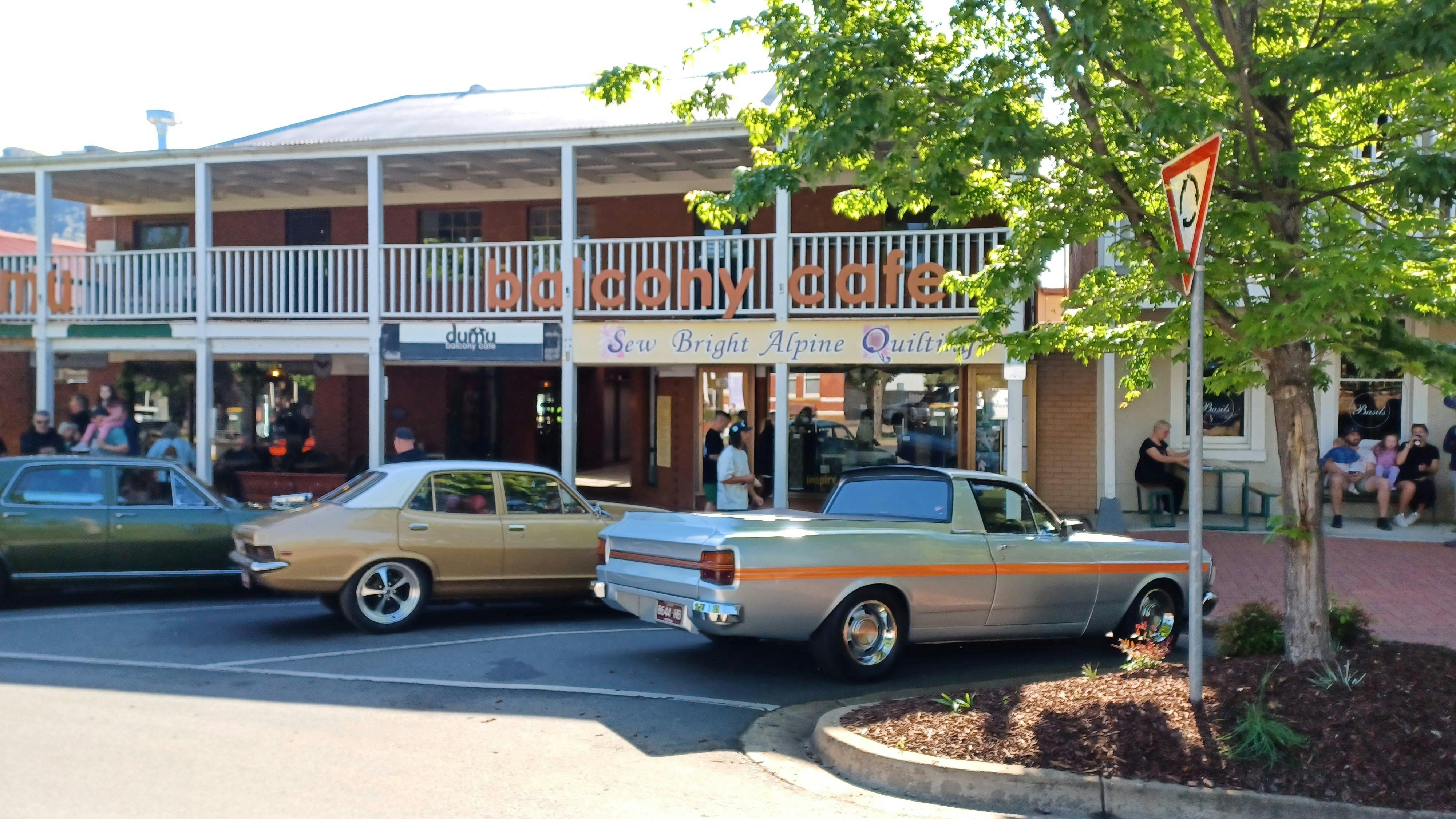 hot Rods parked outside Sew Bright Alpine Quilting shop in Bright
