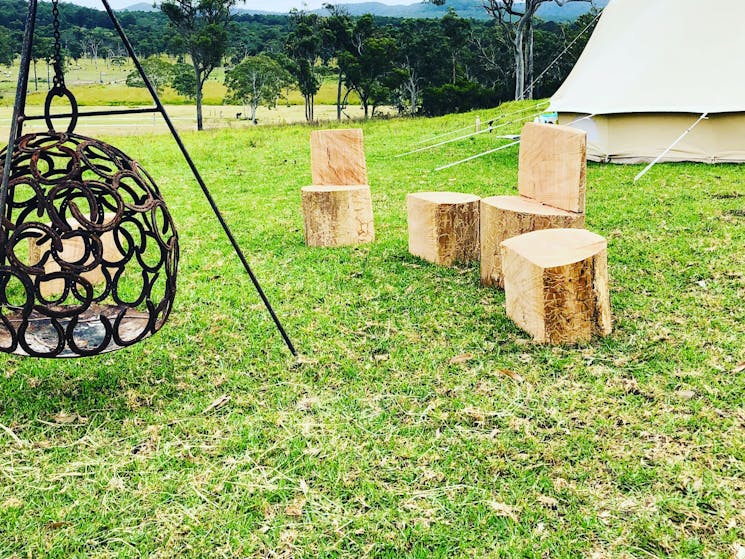 Glamping tents and fire/stools