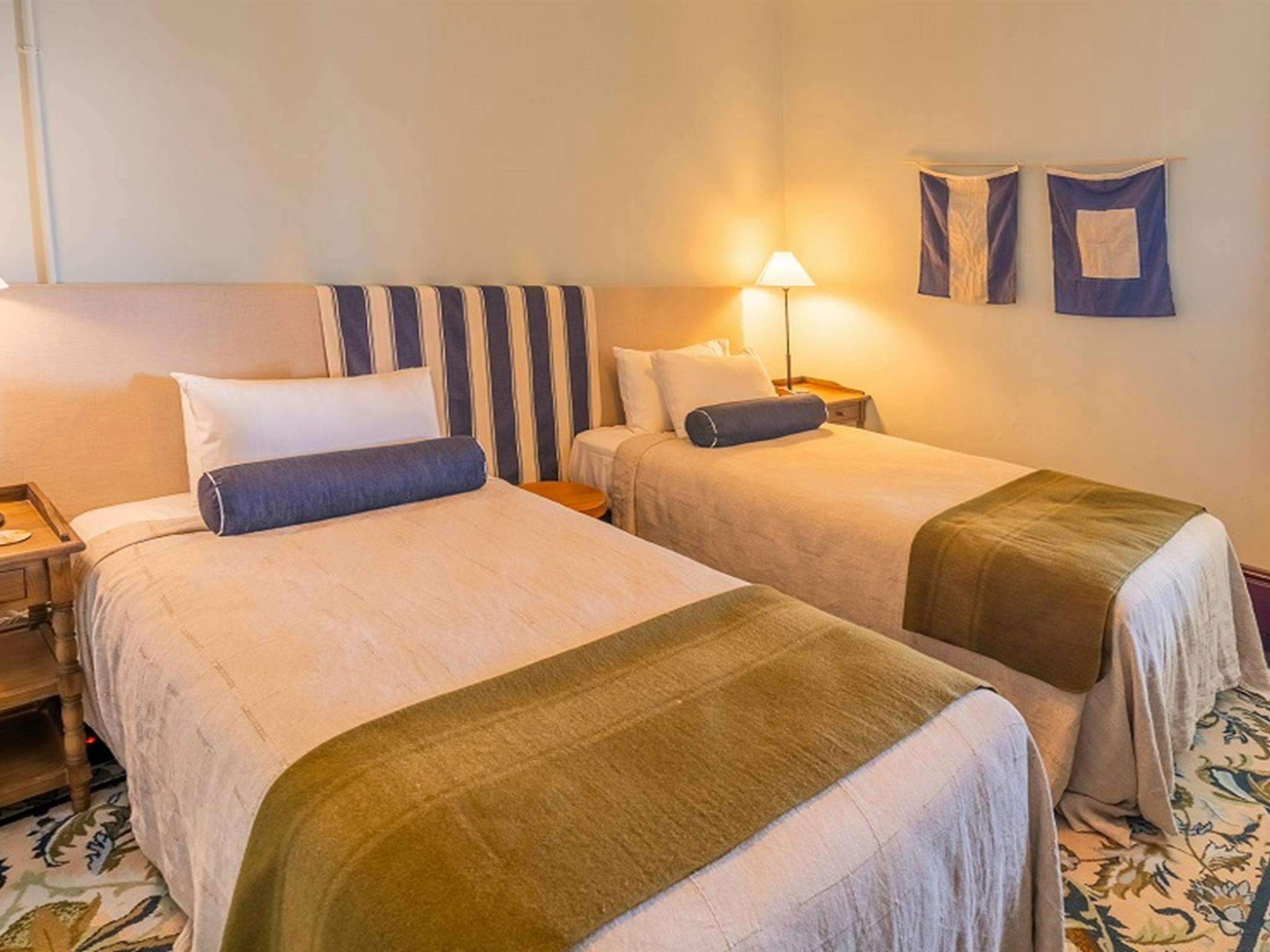 拜伦角灯塔助理管理员小屋，2号小屋，单人床。图片来源：约翰