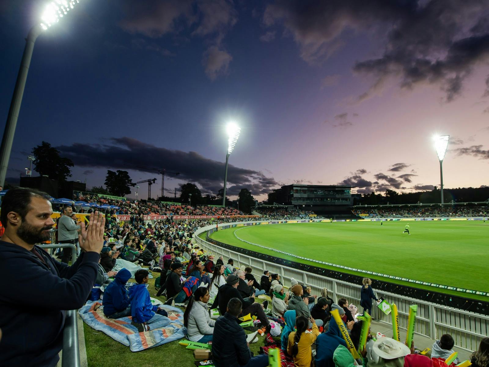 Wide shot view of Manuka Oval filled with fans