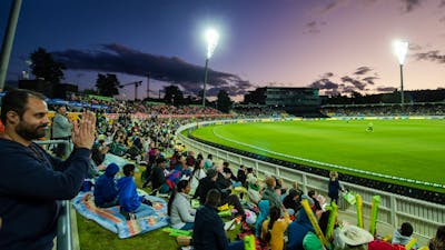Wide shot view of Manuka Oval filled with fans
