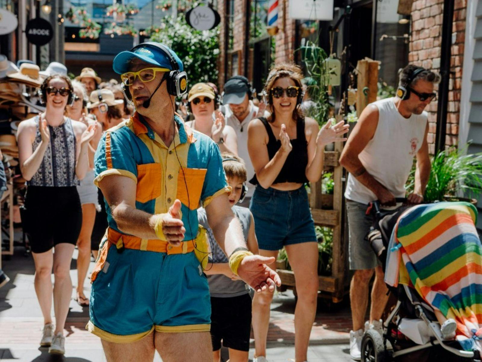 Guru Dudu Silent Disco Walking Tour,  Fun Visit Melbourne entertainment, Mr Motion, Dance,  90s fun
