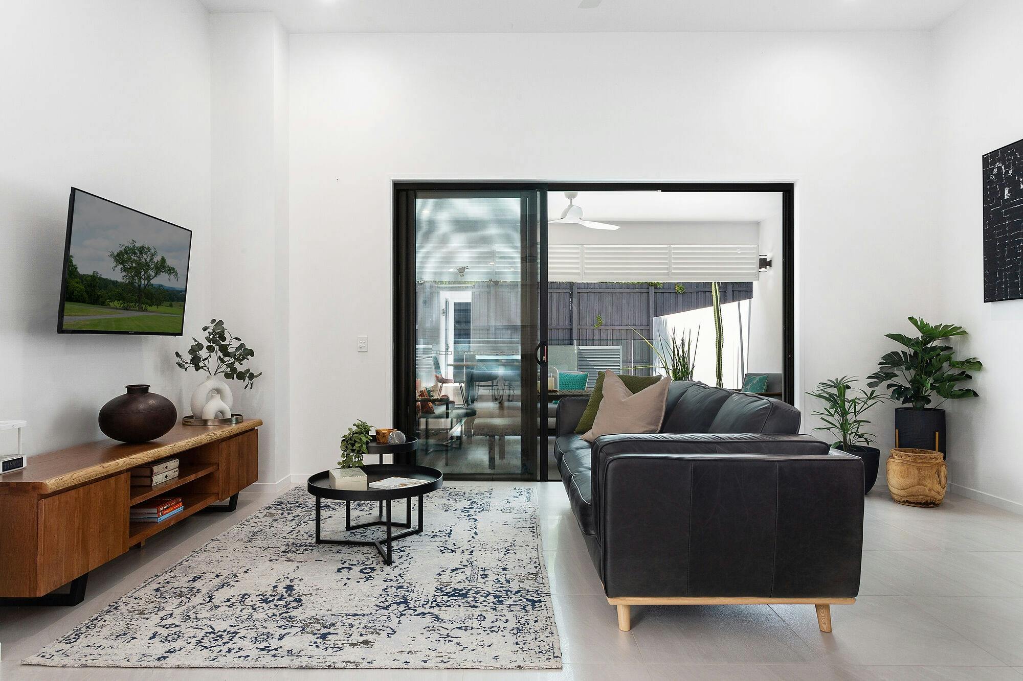 The lounge area flows out to covered outdoor living