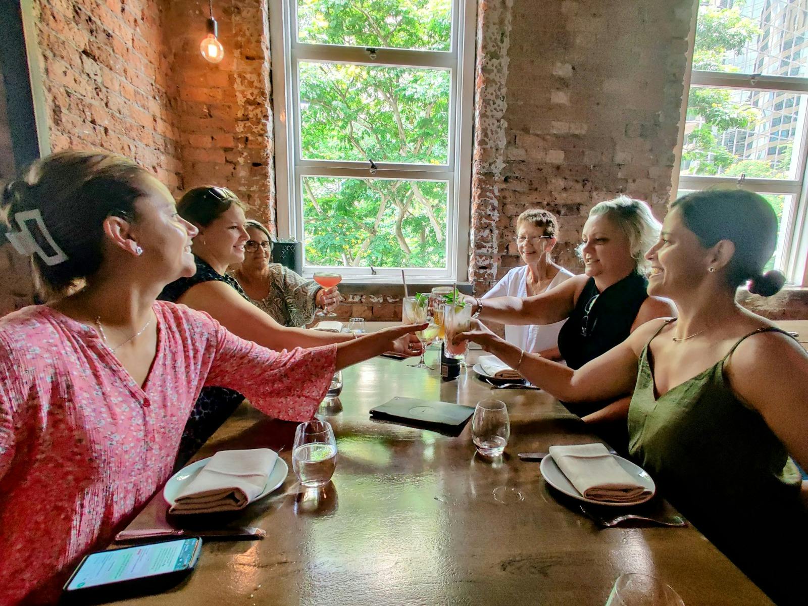 Guests enjoying a drink at an iconic location