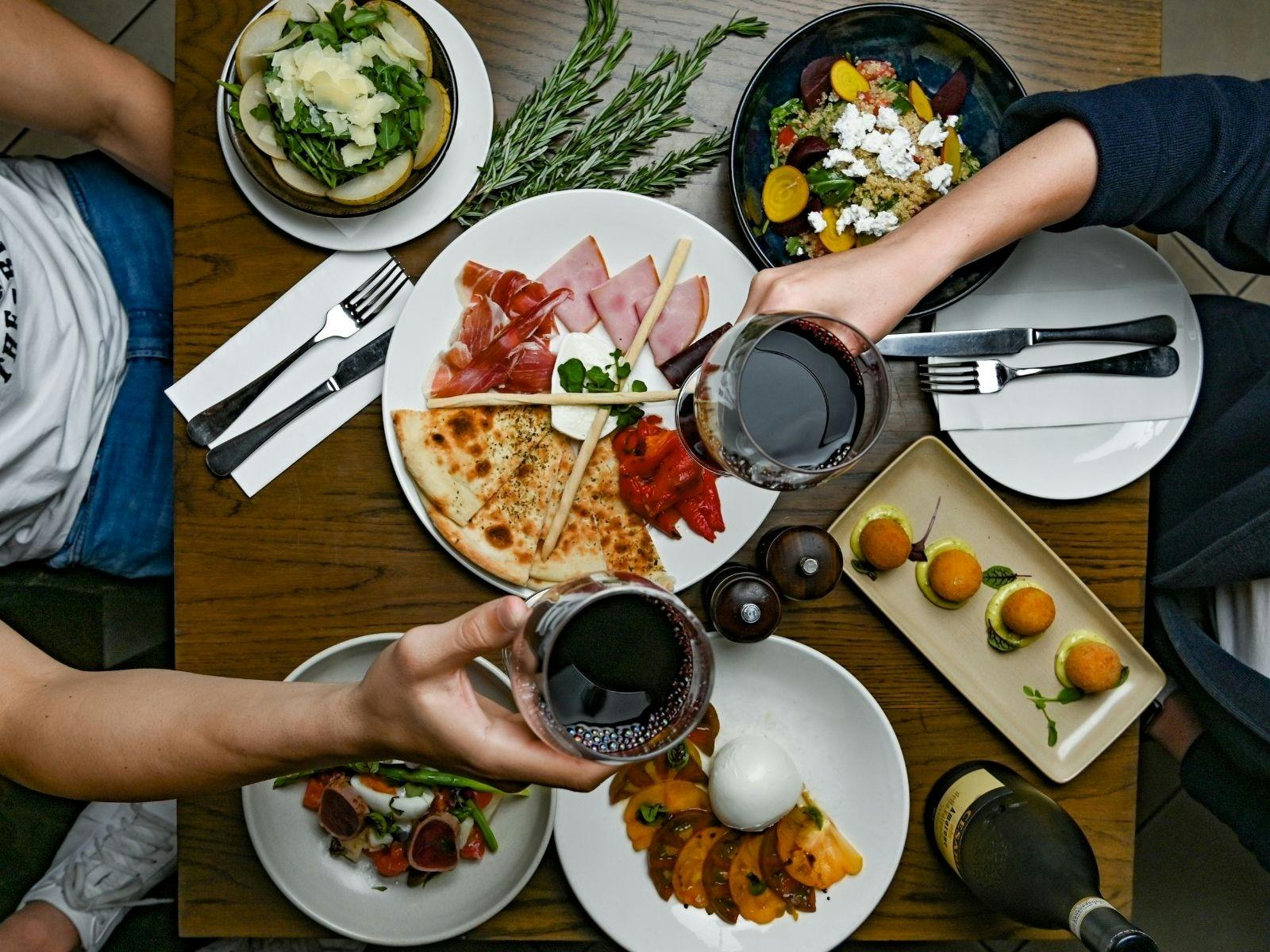Eastbank Cafe, flat lay of starter and appetiser dishes including an antipasto plate