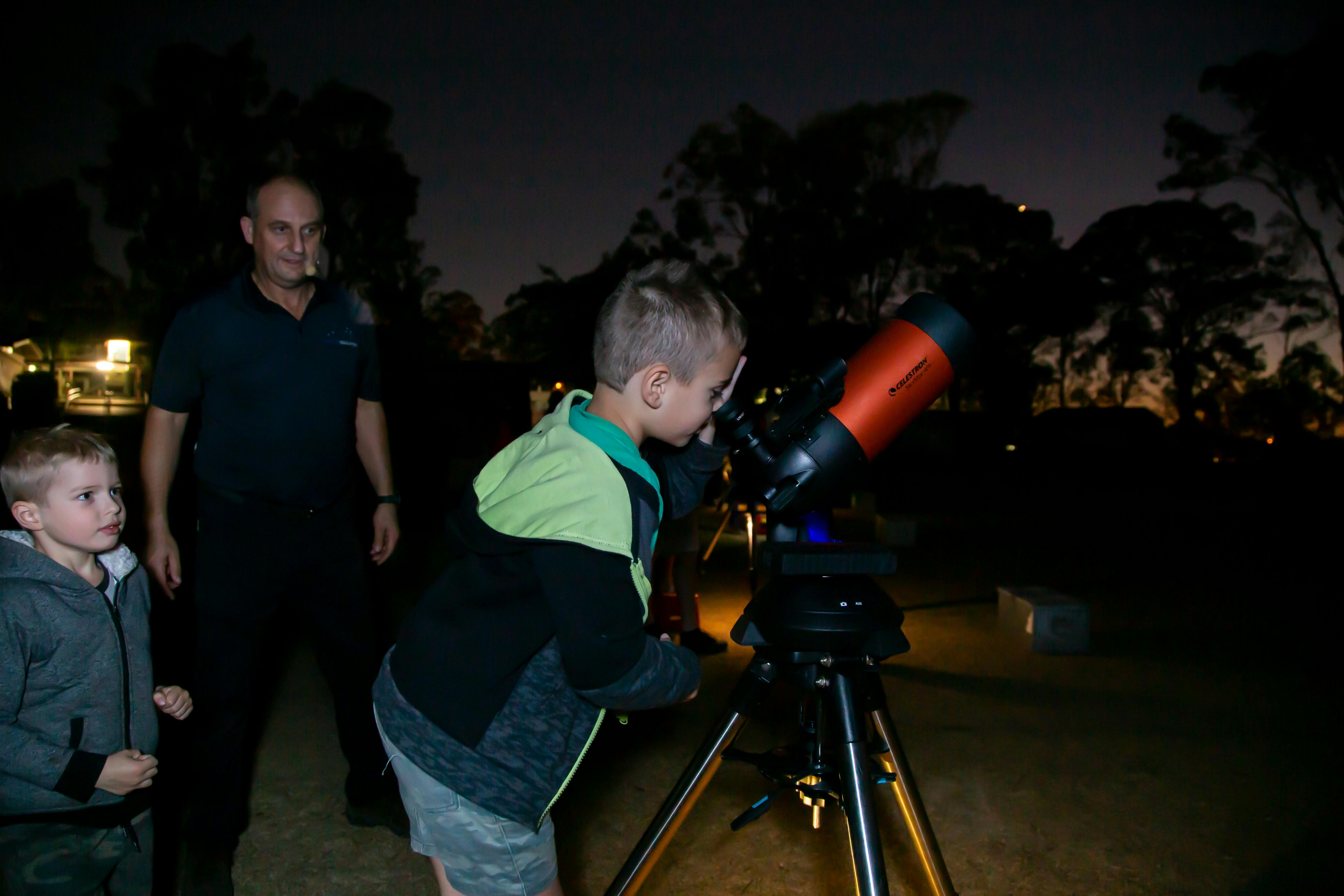 Boy with telescope