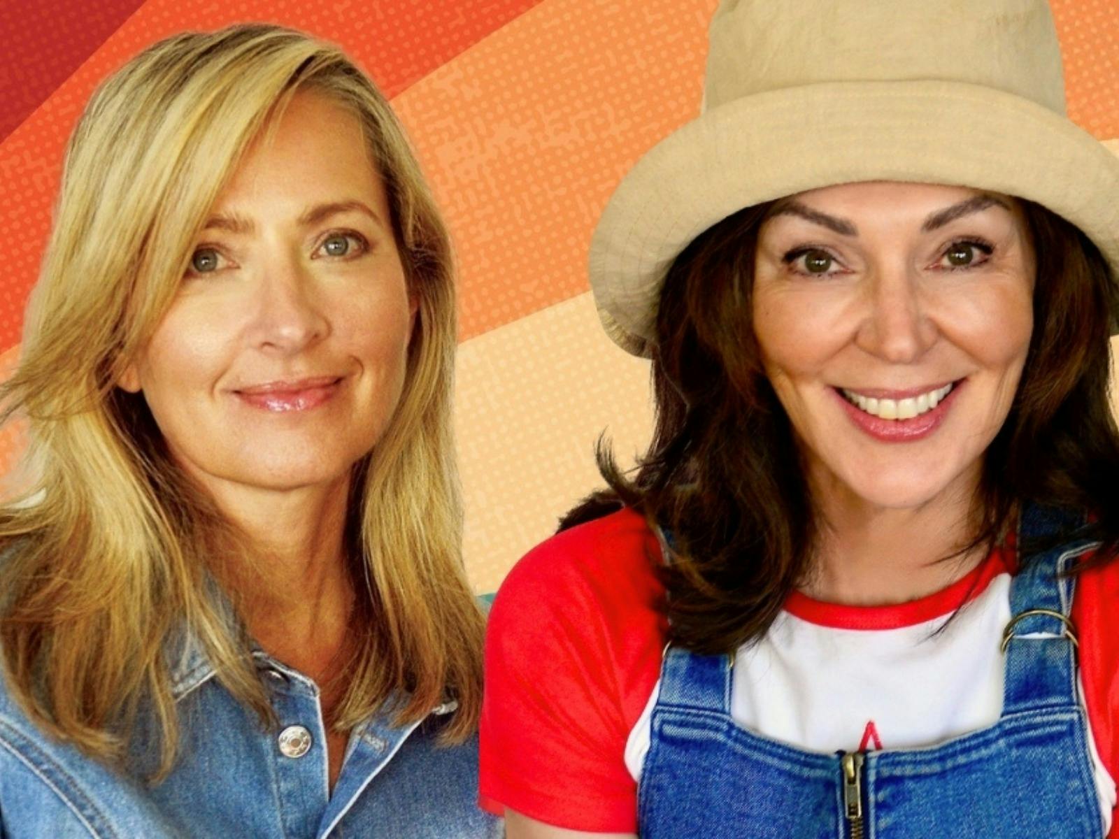 2 women smiling, one woman wearing a hat