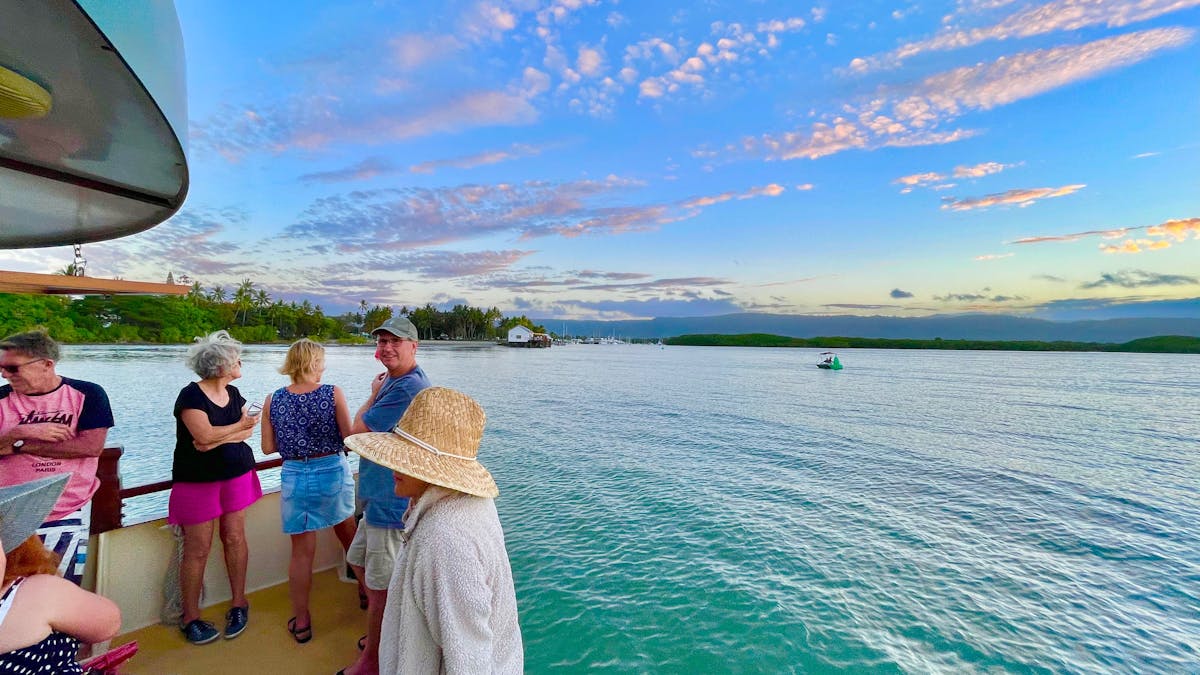 Guests aboard Lady Douglas enjoying their sunset sail, in Port Douglas, Tropical North Queensland