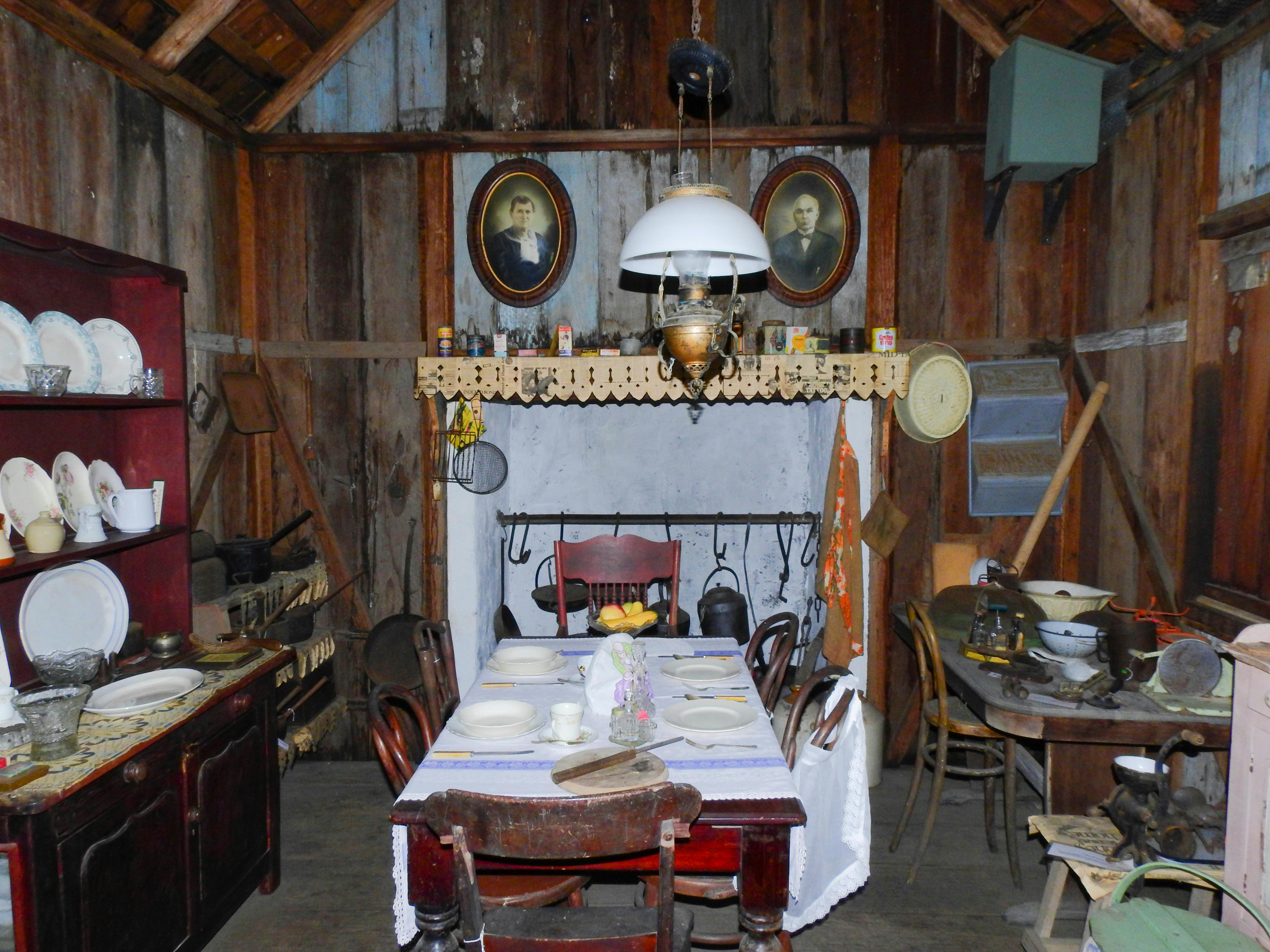 The cottage kitchen displaying all manner of items used in pioneering life to feed the family.