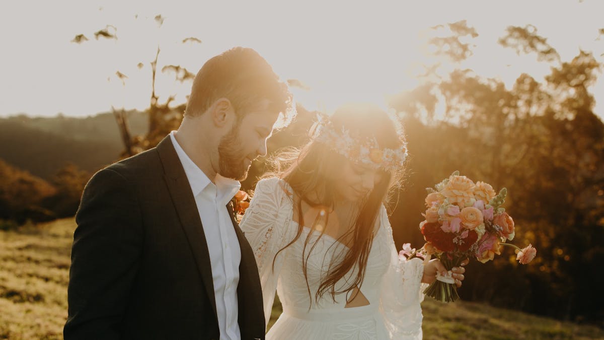 Bride and groom on sunset