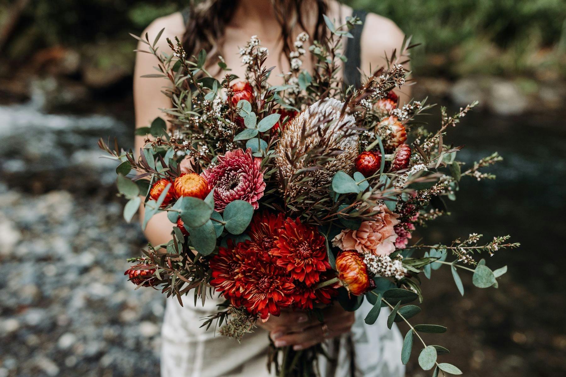 Lady holding bouquet of flowers