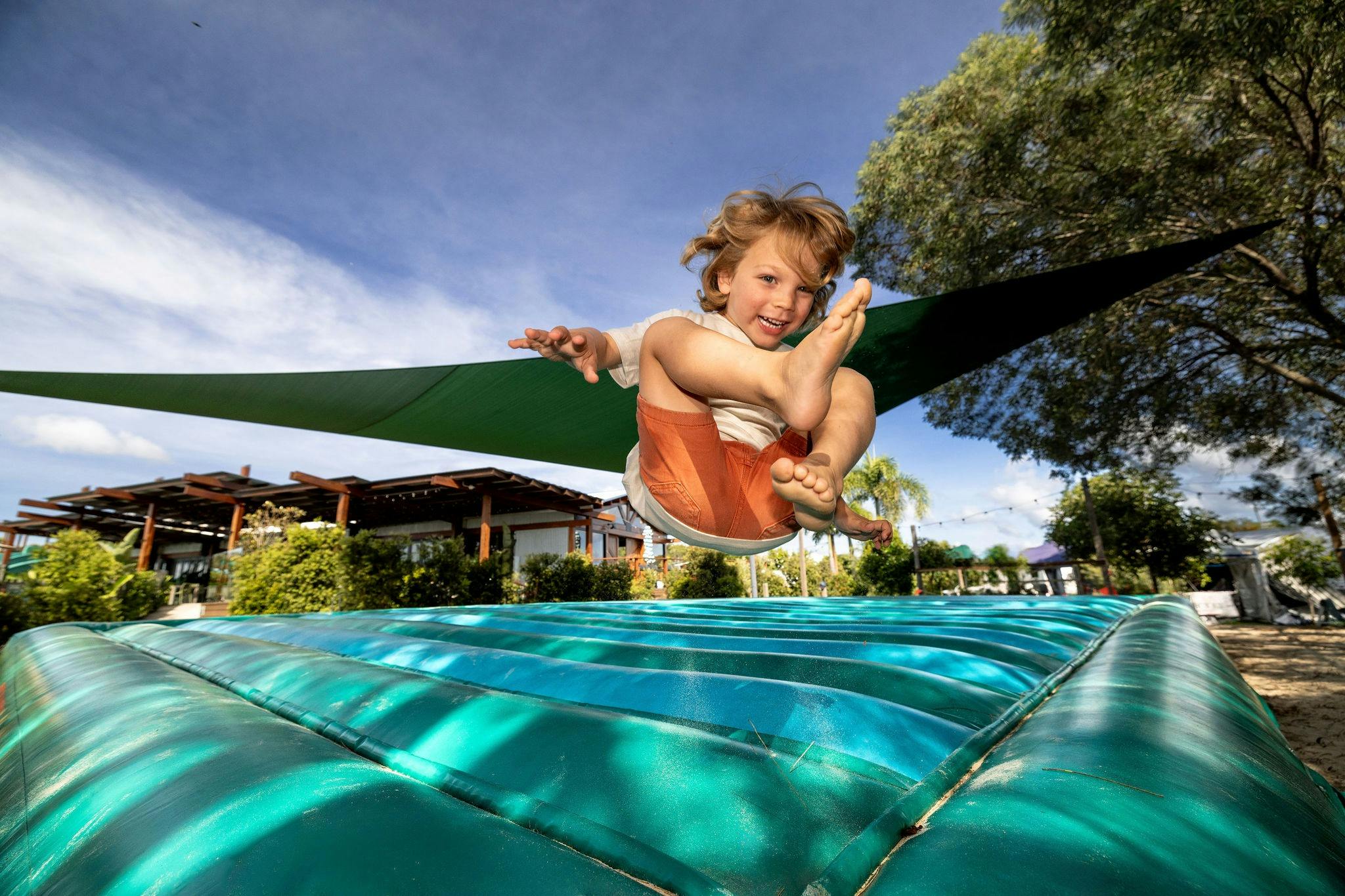 Child on jump mat