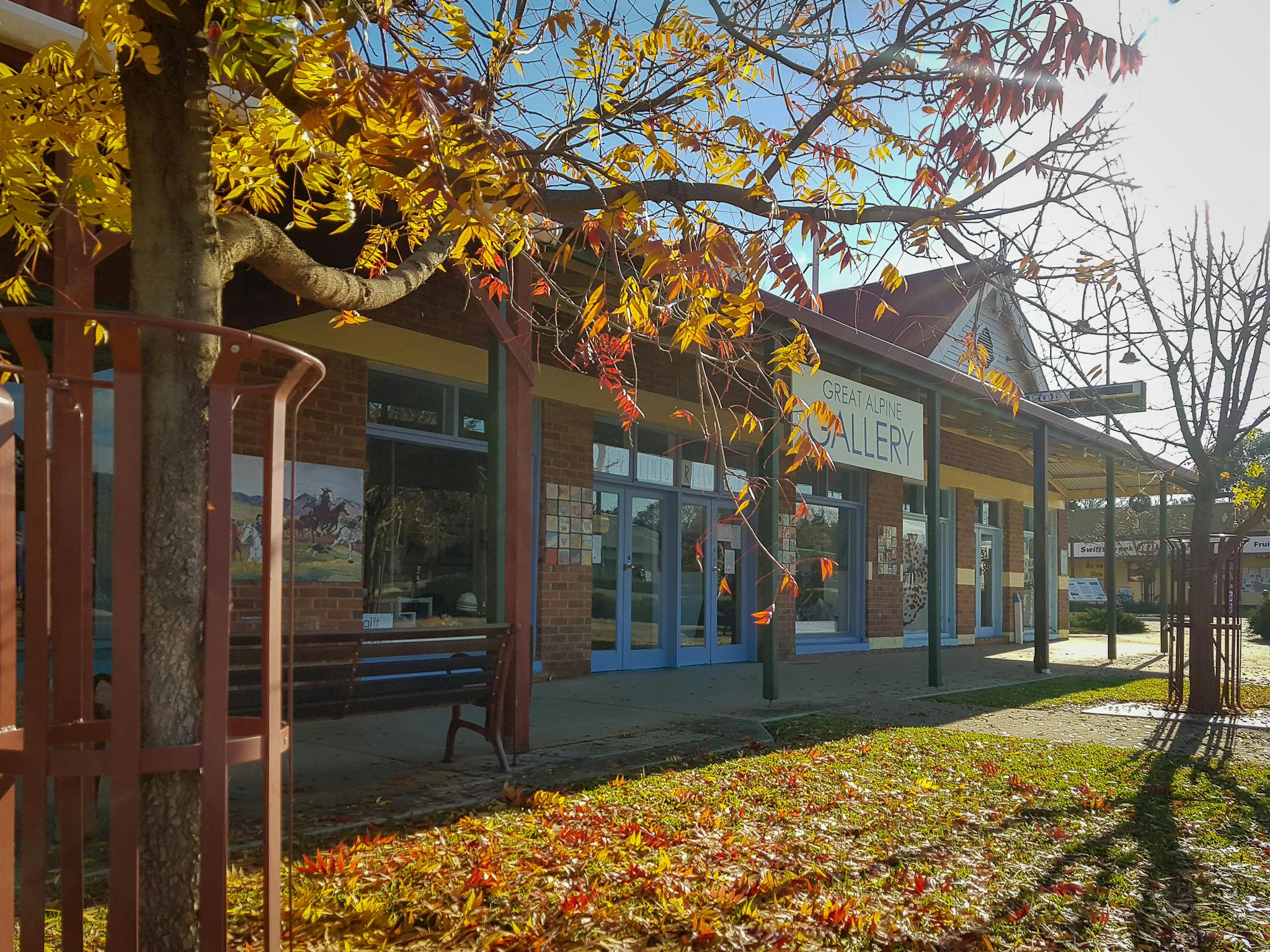 Outside the gallery showing autumn foliage