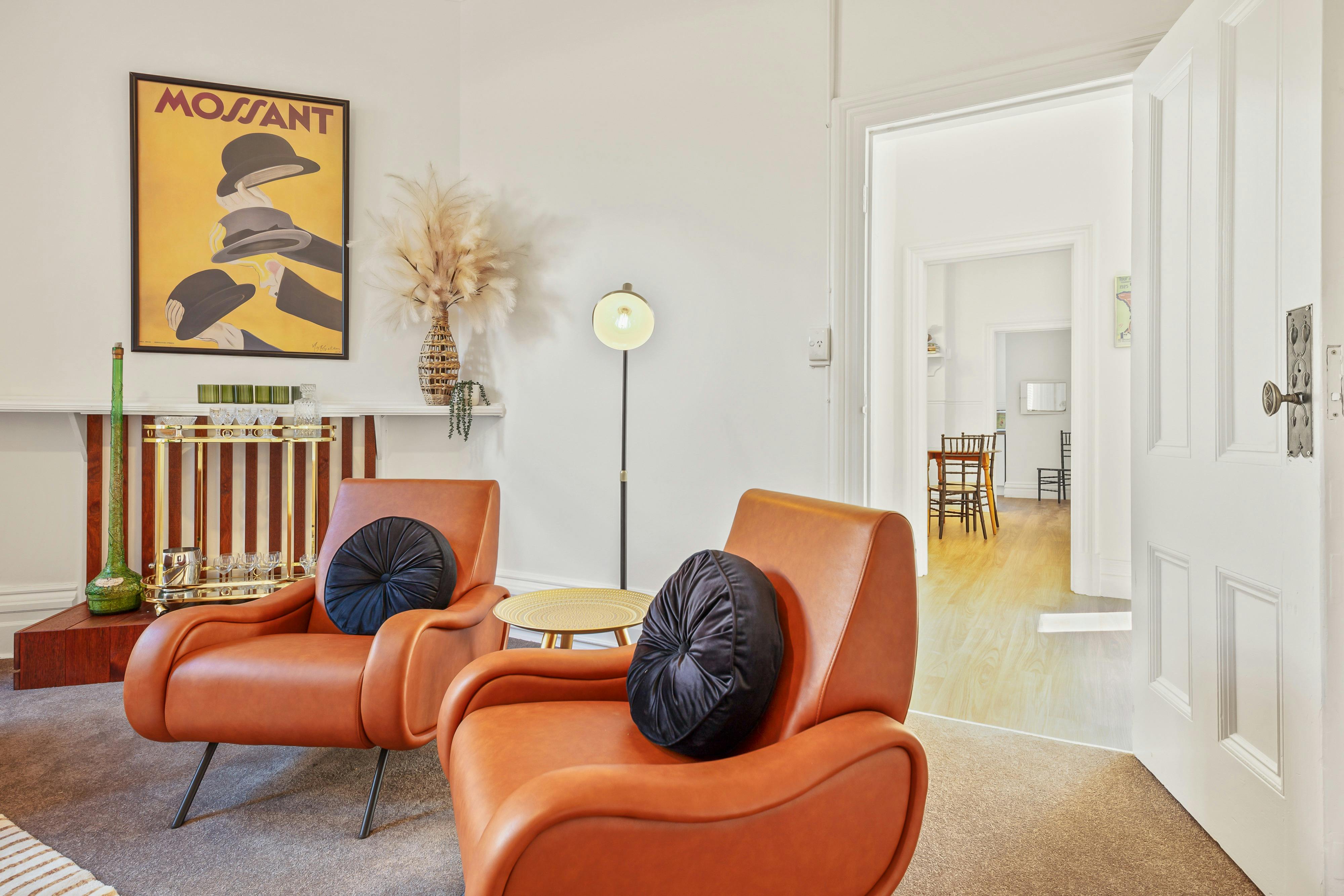 2 x leather armchairs, drinks trolley