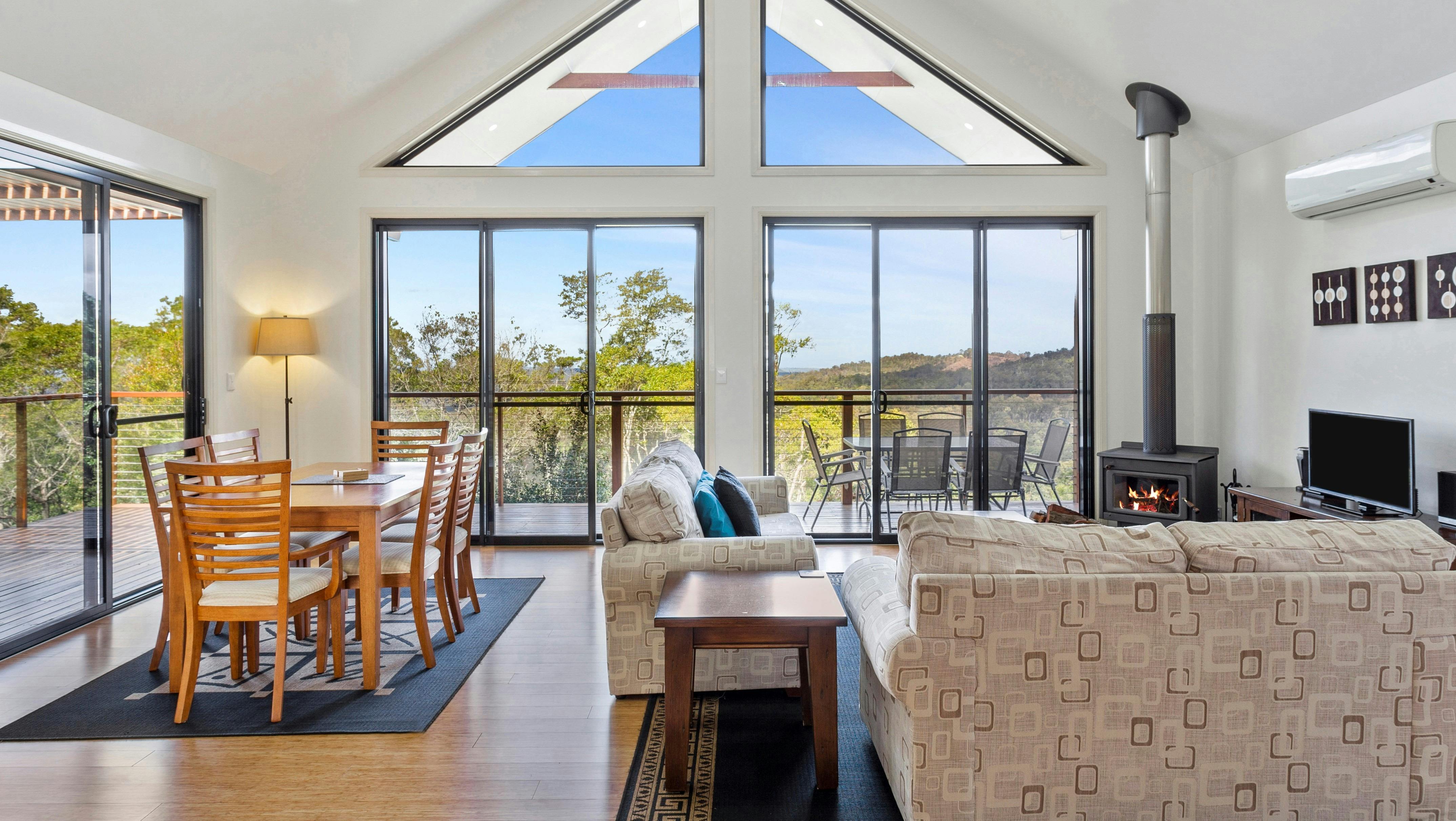 Large lounge room with high ceilings and great picture window with spectacular valley views