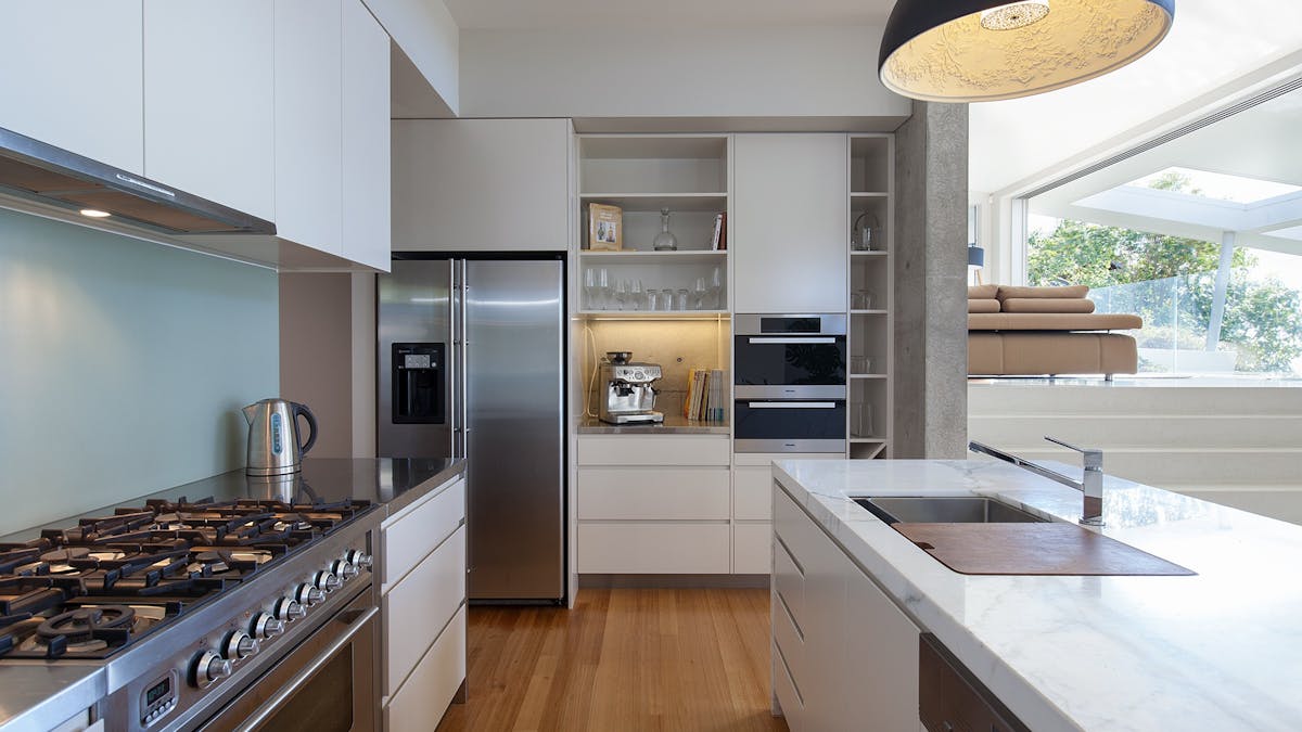 Marble bench tops, walk in pantry and additional butlers kitchen Marble bench tops, walk in pantry and additional butlers kitchen