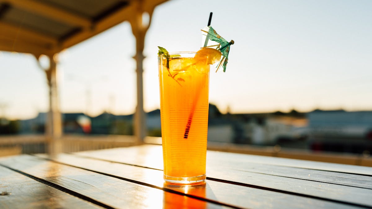 Enjoy our signature cocktail on the deck
