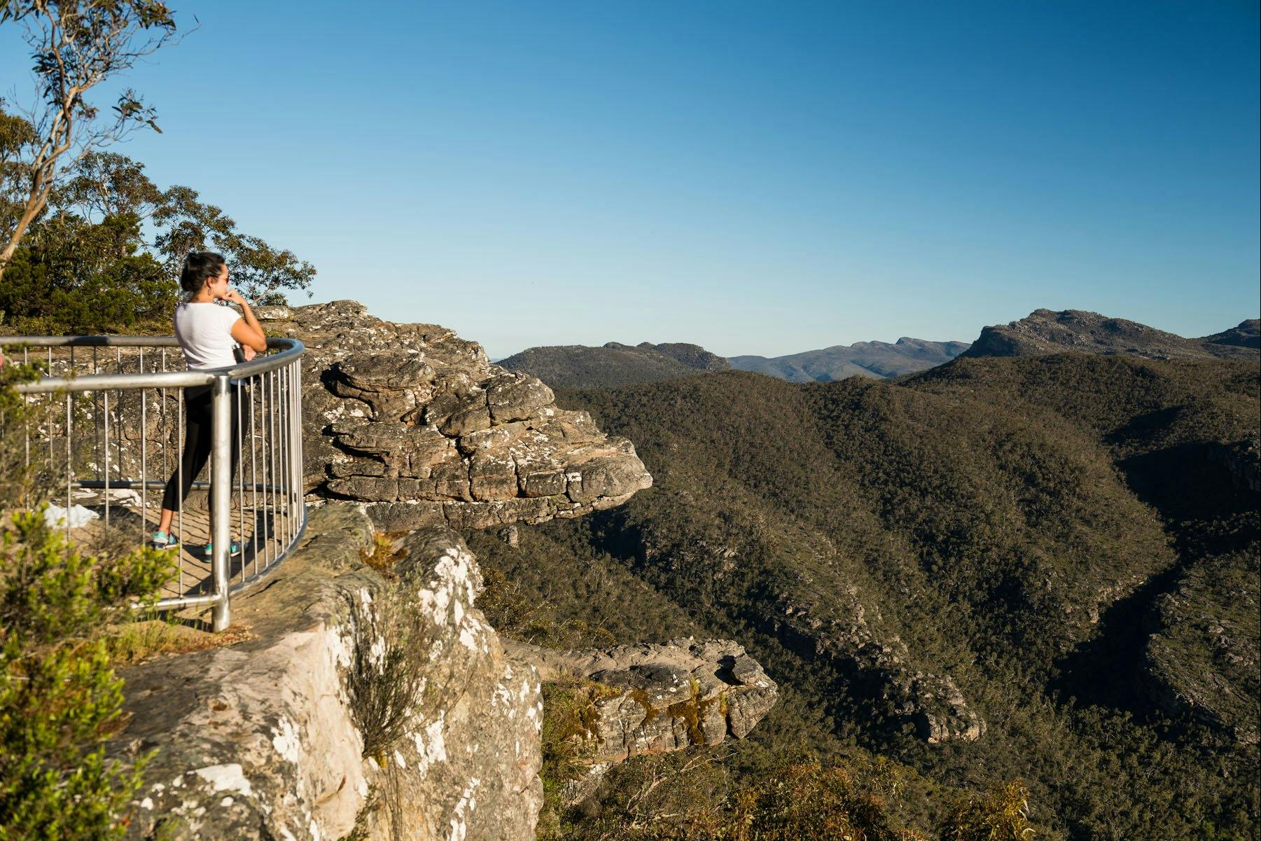 Person standing at The Balconies Lookout looking over the Grampians