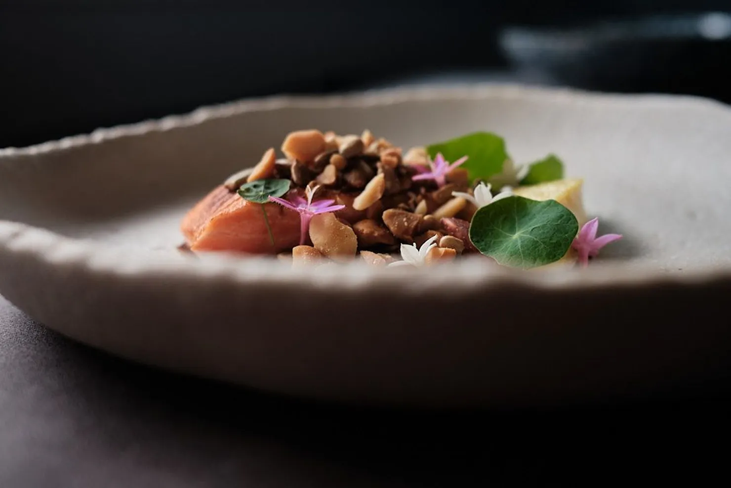 Mi-cuit trout with macadamia served on a handmade plate