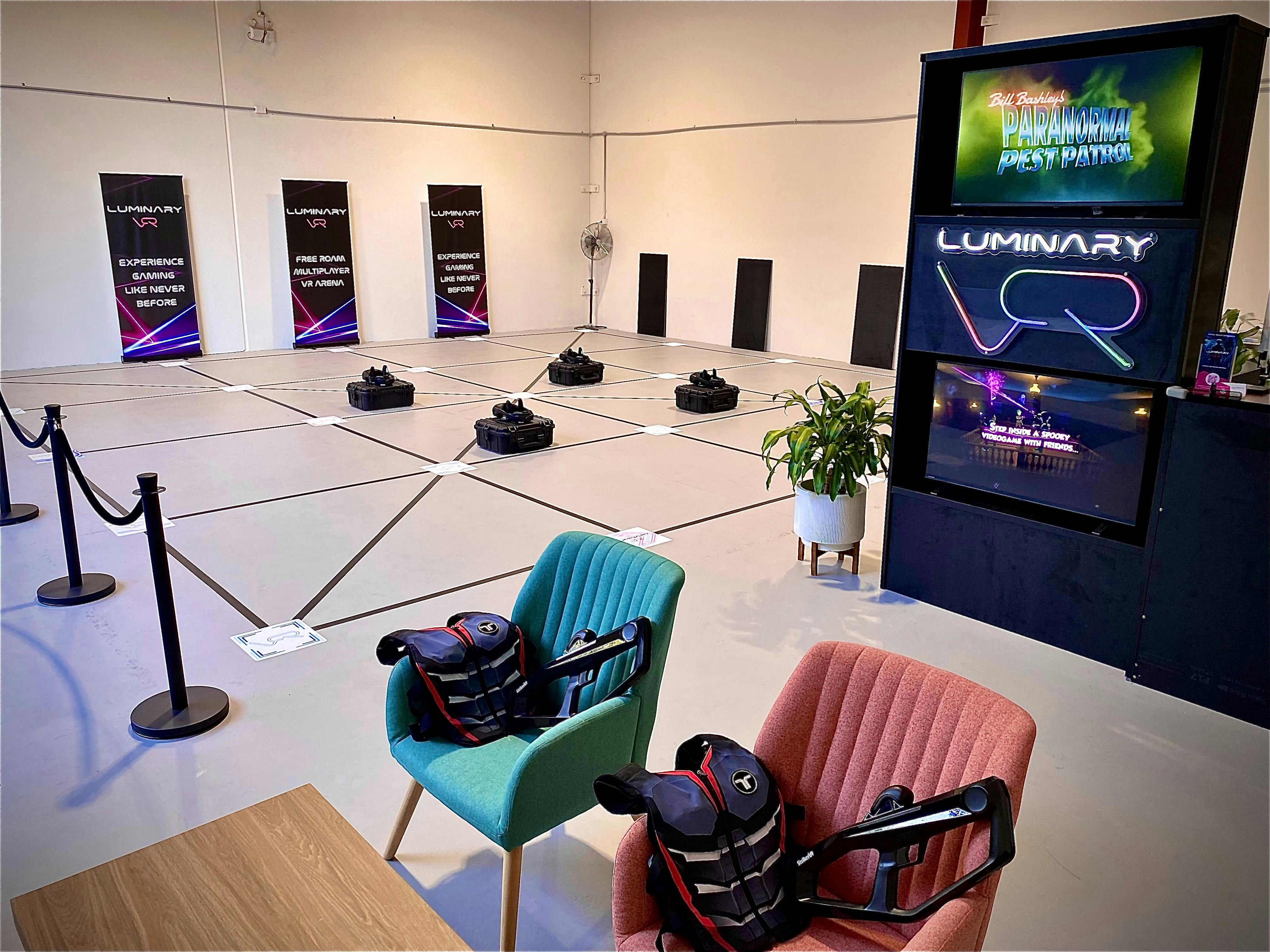 Spacious free-roam VR arena with equipment, ready for immersive virtual reality adventures.