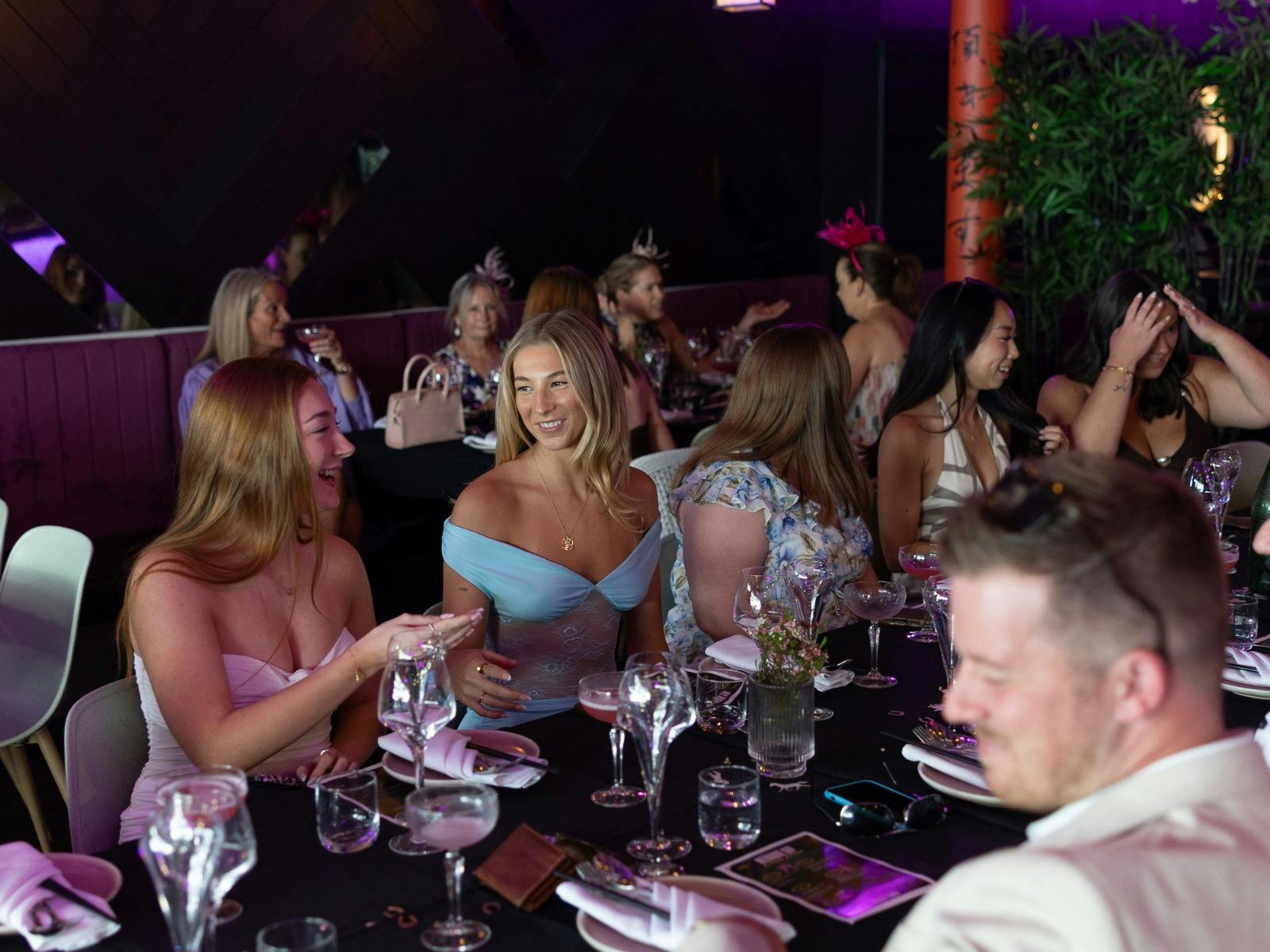 People at down enjoyin Maggie Choo's banquet menu and 3 hour deluxe drinks package