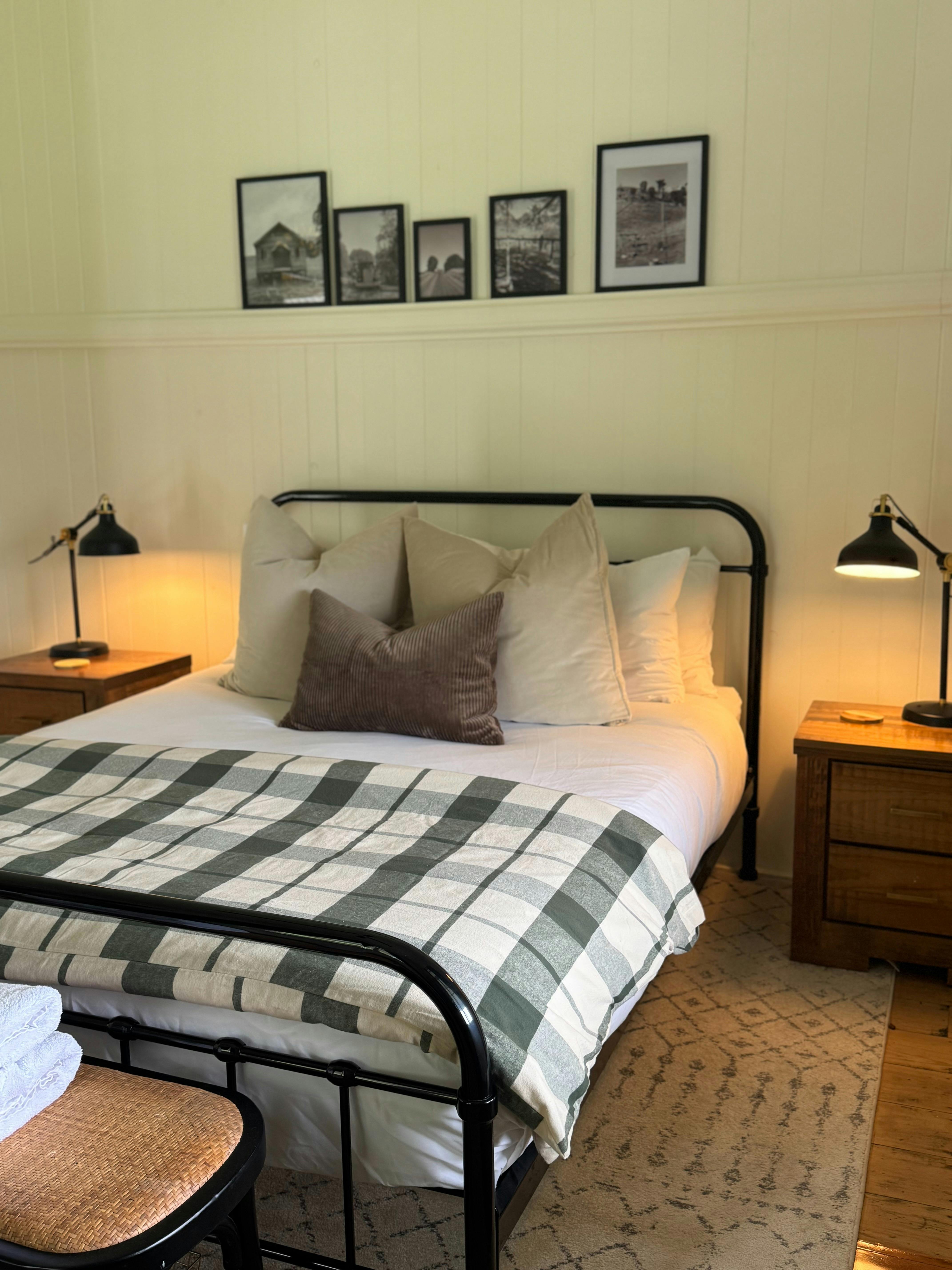 Queen room 1 with luxury linen overlooking the deck and property