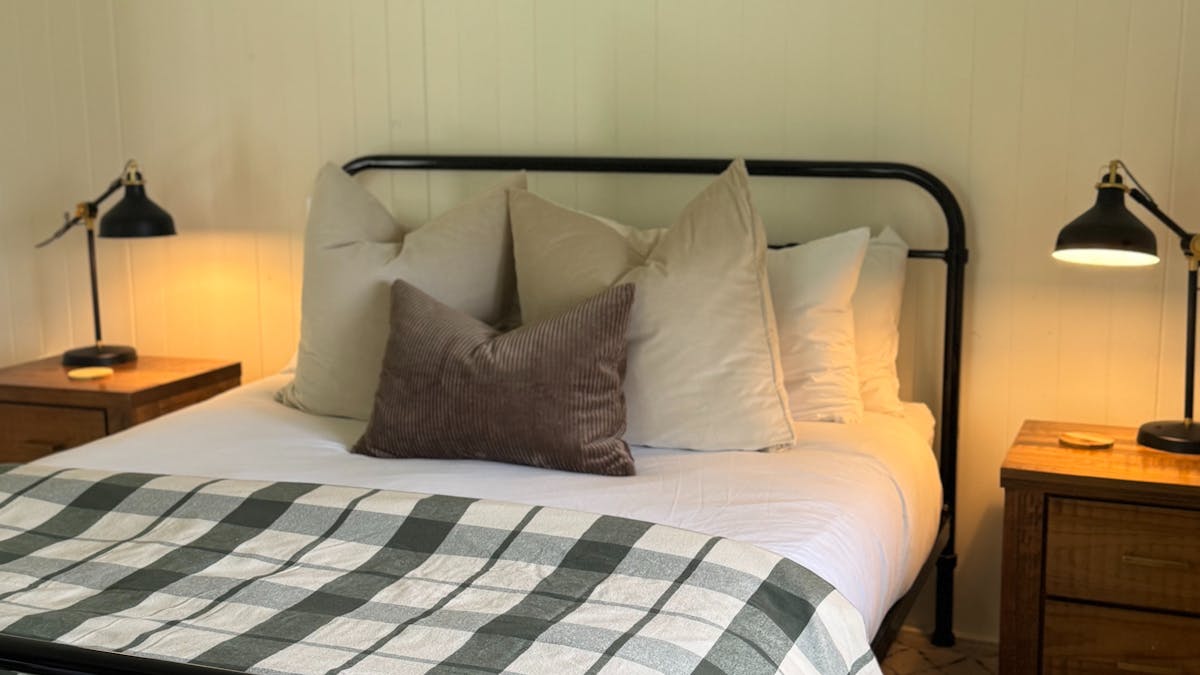 queen room 1 overlooking the view out to the range, luxury farm stray brisbane