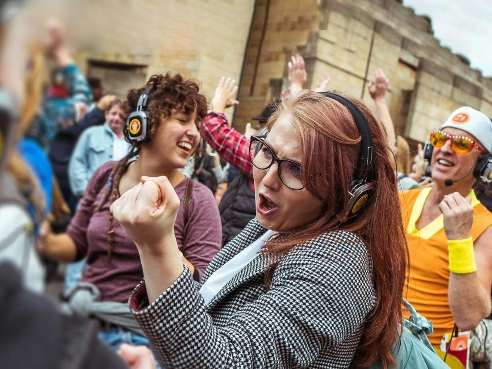 Guru Dudu Silent Disco Walking Tour, people laughing, having fun, dancing in Brisbane