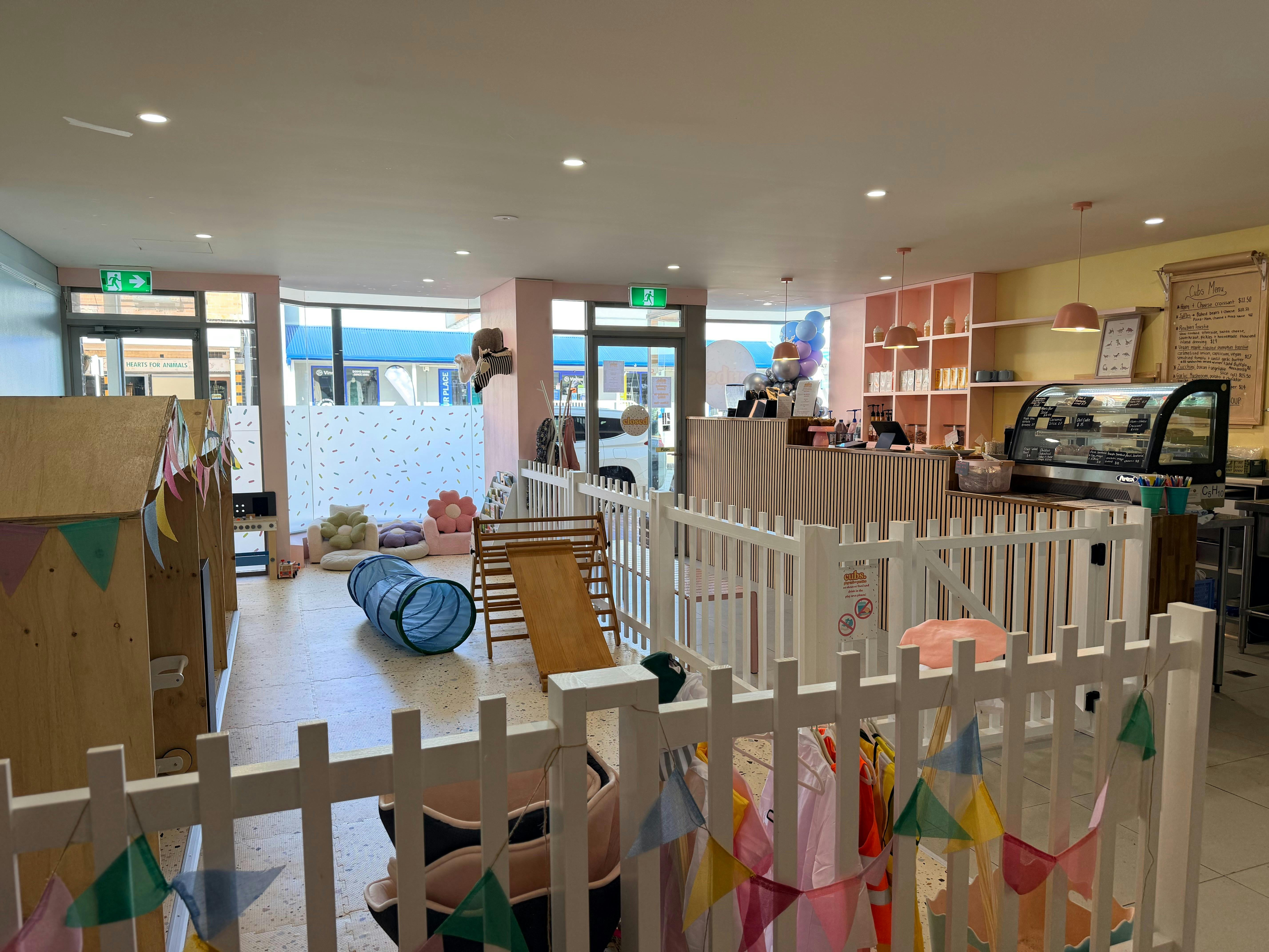 This photo shows our enclosed play area and cafe entry