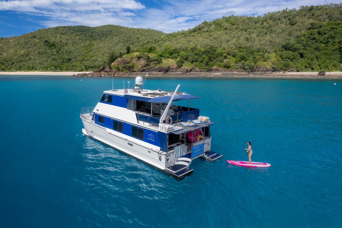 Aerial image of Endless Days vessel and paddleboarder